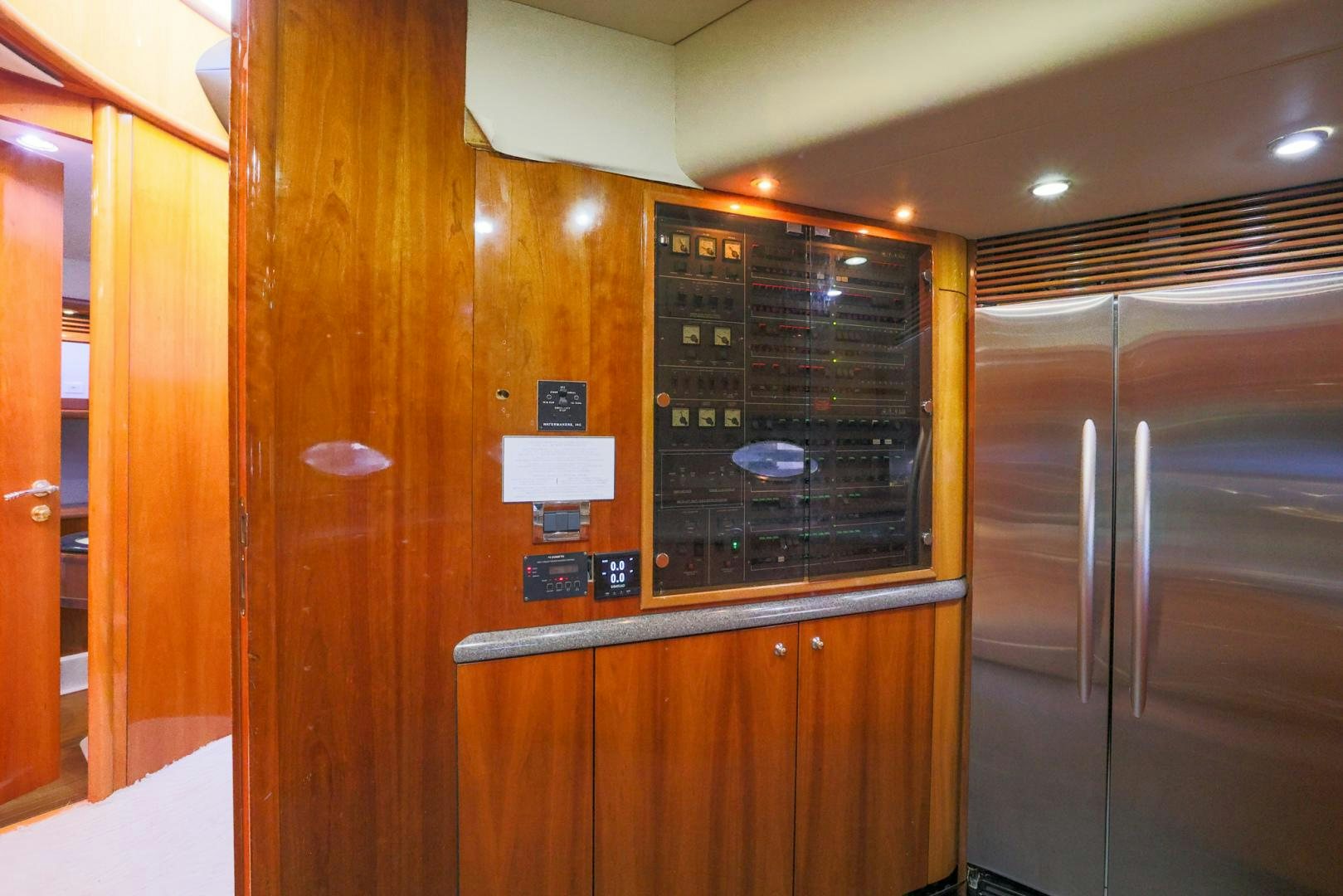 a large cabinet with a screen aboard SIROCCO Yacht for Sale