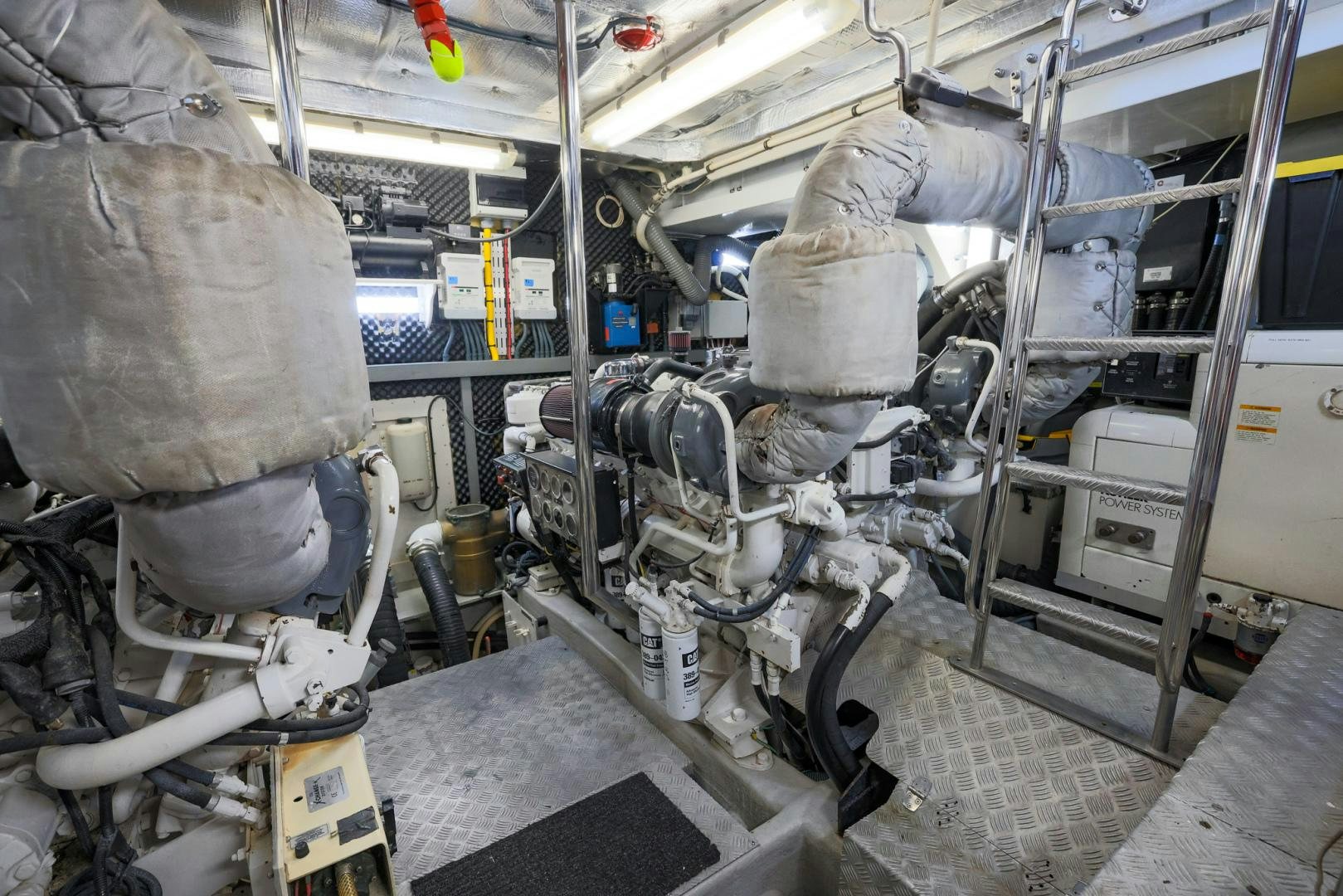 a large machine in a factory aboard SIROCCO Yacht for Sale