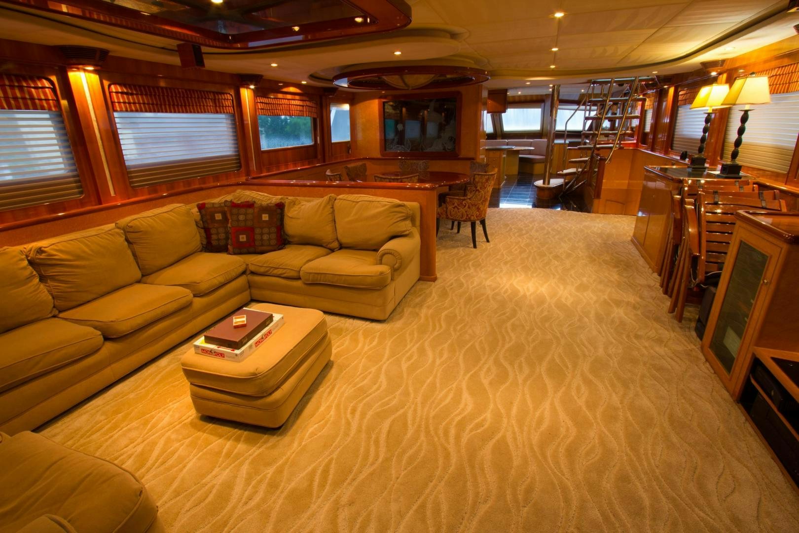 a large living room with a large rug aboard GLEN ELLEN Yacht for Sale