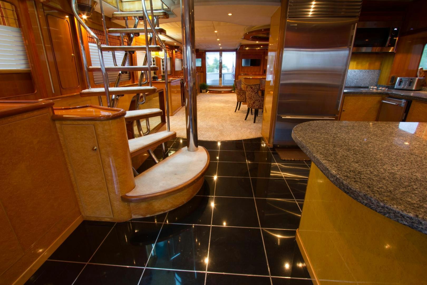 a large kitchen with a large island aboard GLEN ELLEN Yacht for Sale
