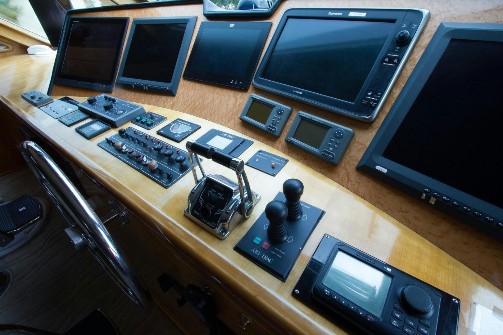 a table with a computer and other electronics on it aboard GLEN ELLEN Yacht for Sale
