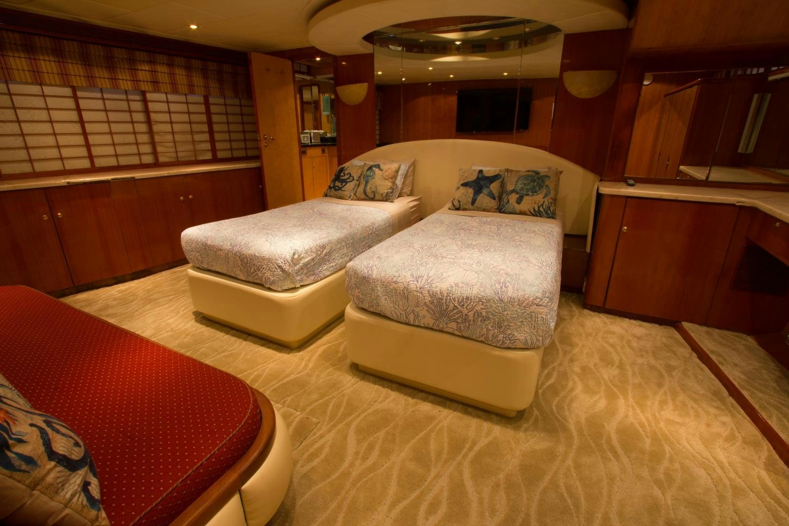 a living room with a couch and a bed aboard GLEN ELLEN Yacht for Sale