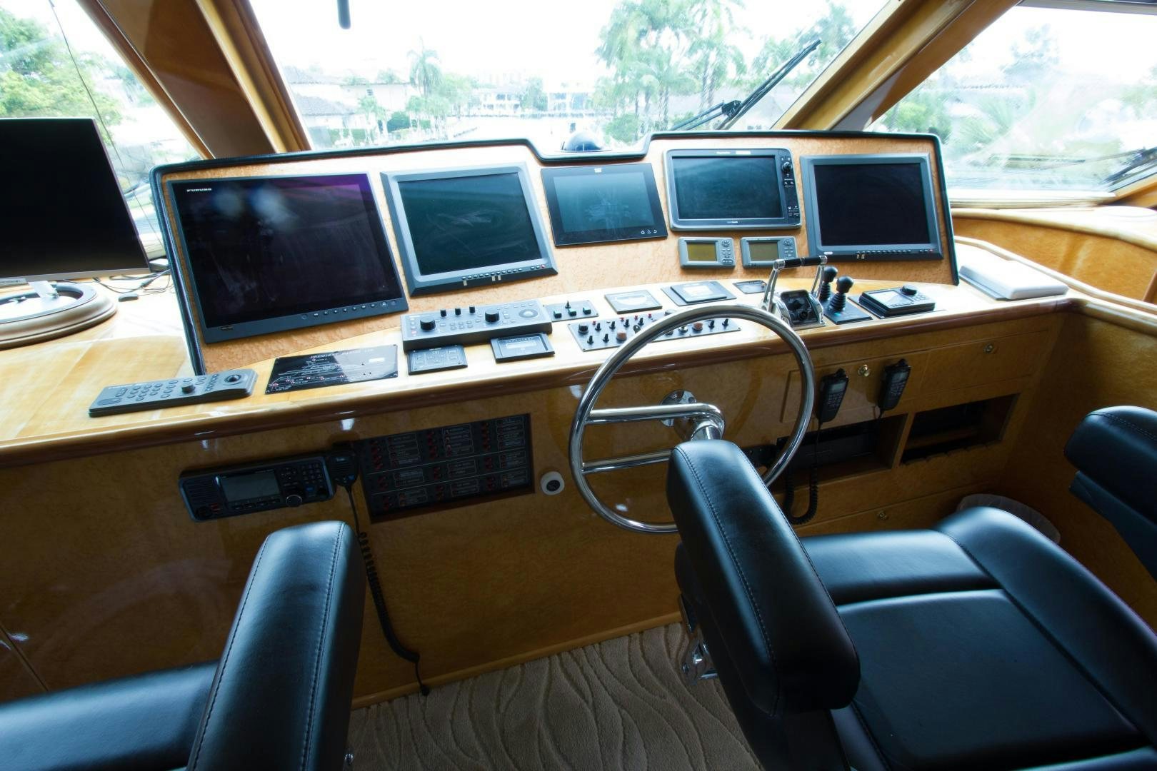 a row of computers on a table aboard GLEN ELLEN Yacht for Sale
