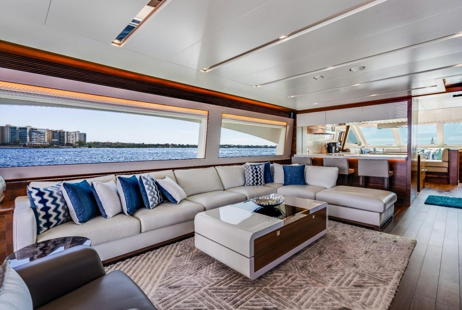 a living room with a large window aboard TI AMO Yacht for Sale