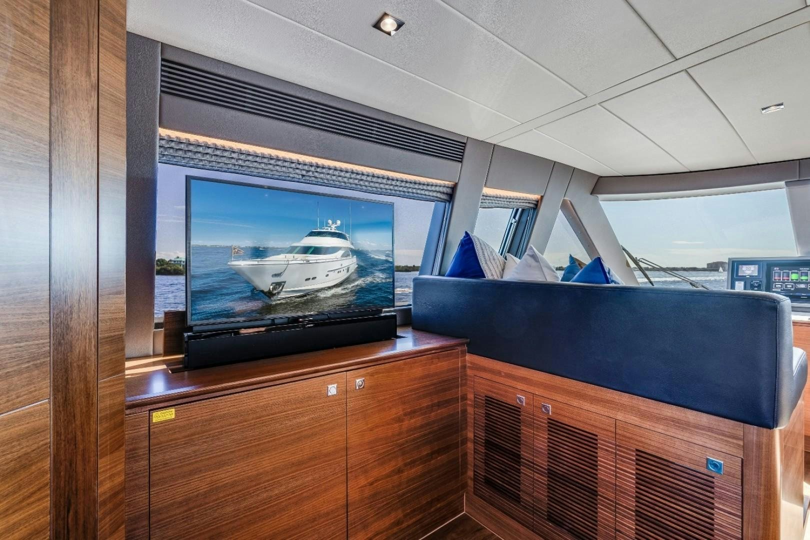 a tv on a cabinet aboard TI AMO Yacht for Sale