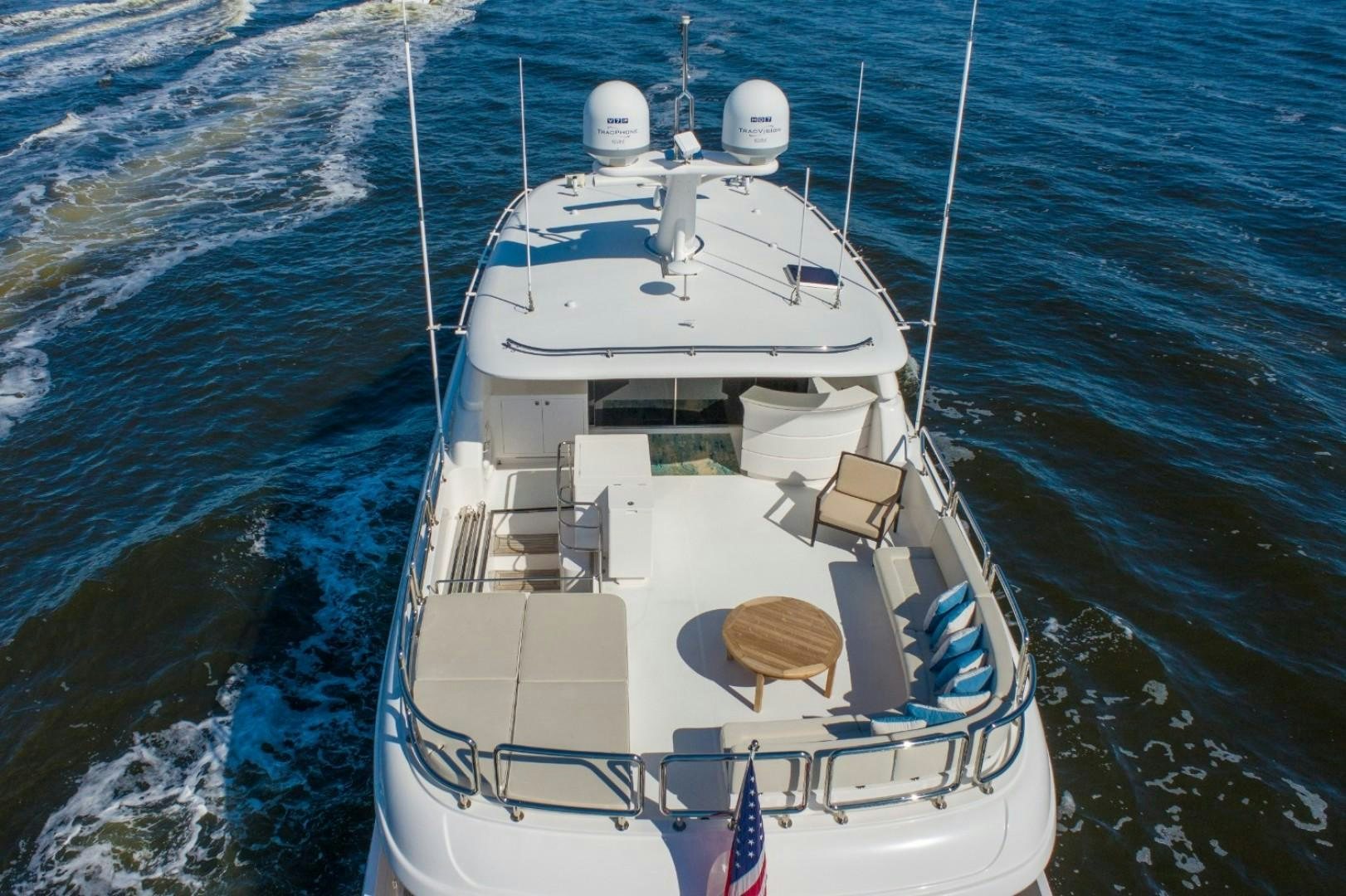 a white boat in the water aboard TI AMO Yacht for Sale