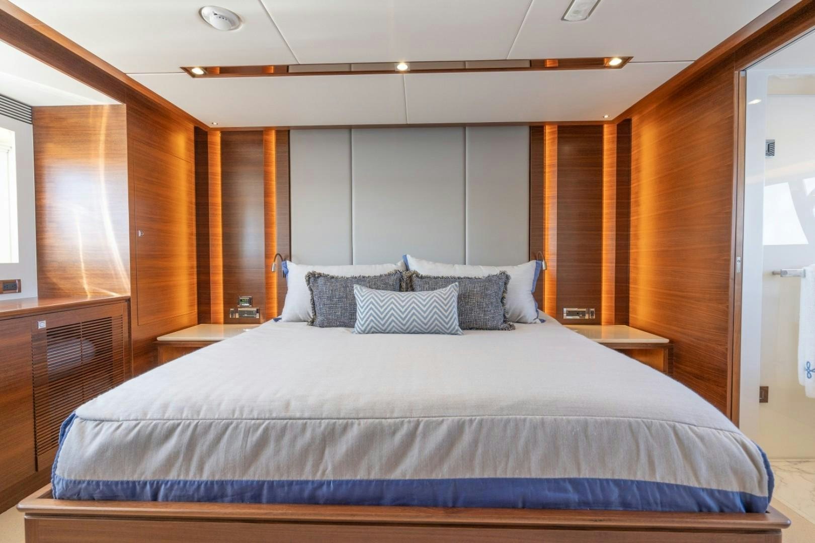 a bed in a room aboard TI AMO Yacht for Sale