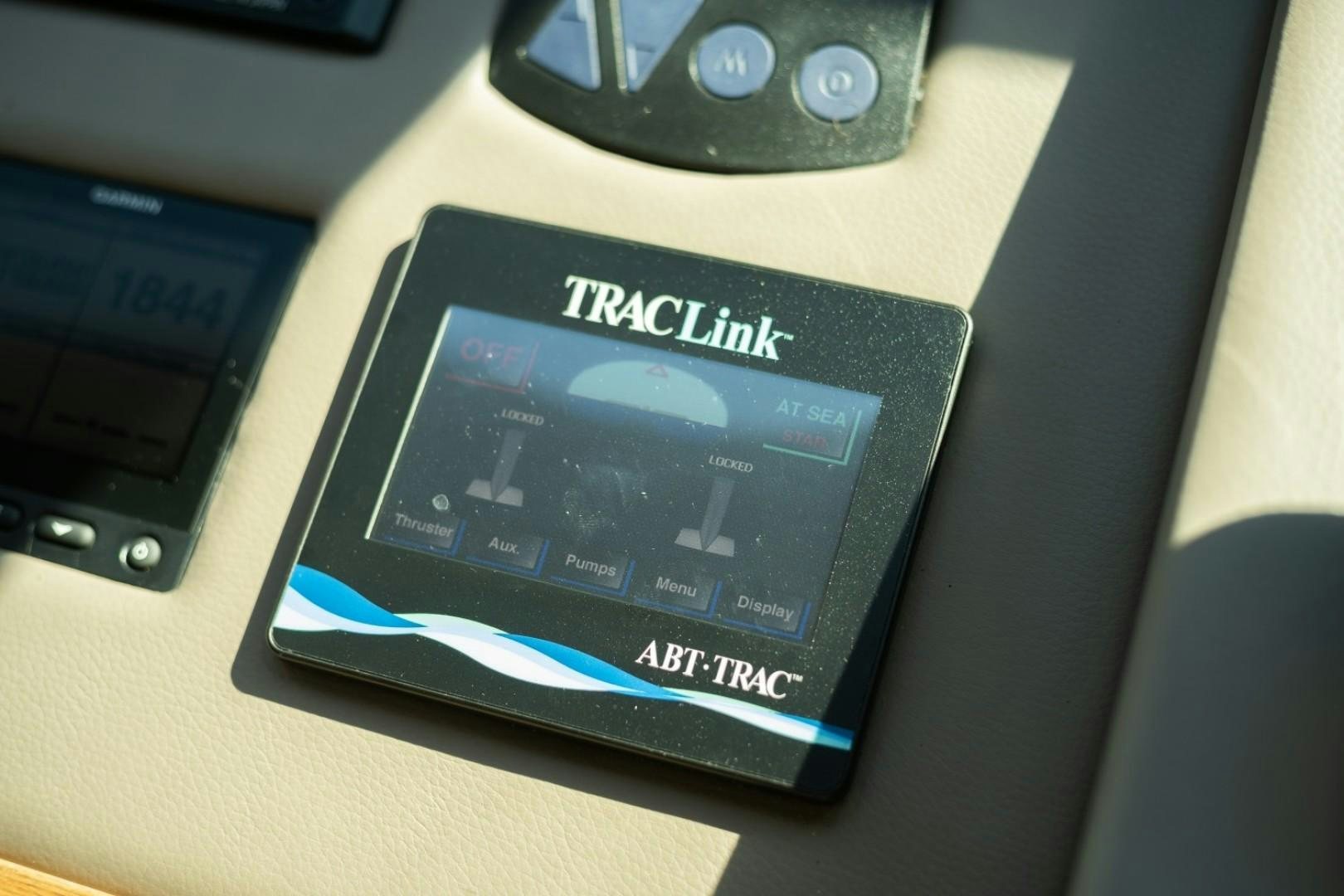 a close-up of a cell phone aboard TI AMO Yacht for Sale