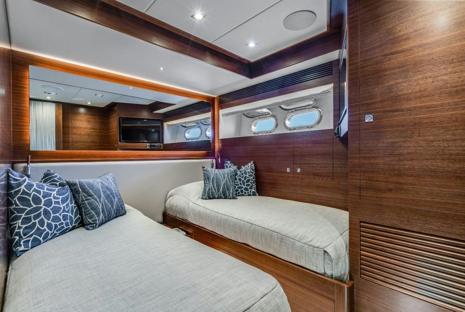 a room with two beds aboard TI AMO Yacht for Sale