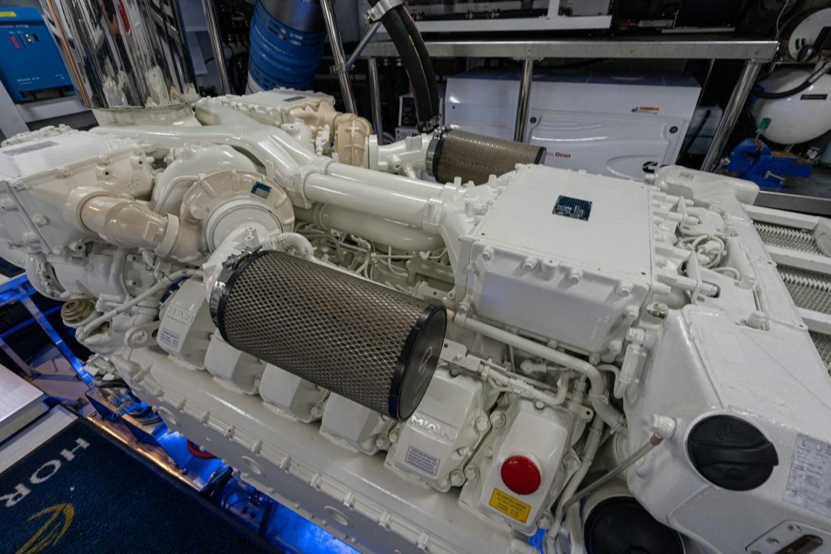 a machine with a large piece of equipment in it aboard TI AMO Yacht for Sale