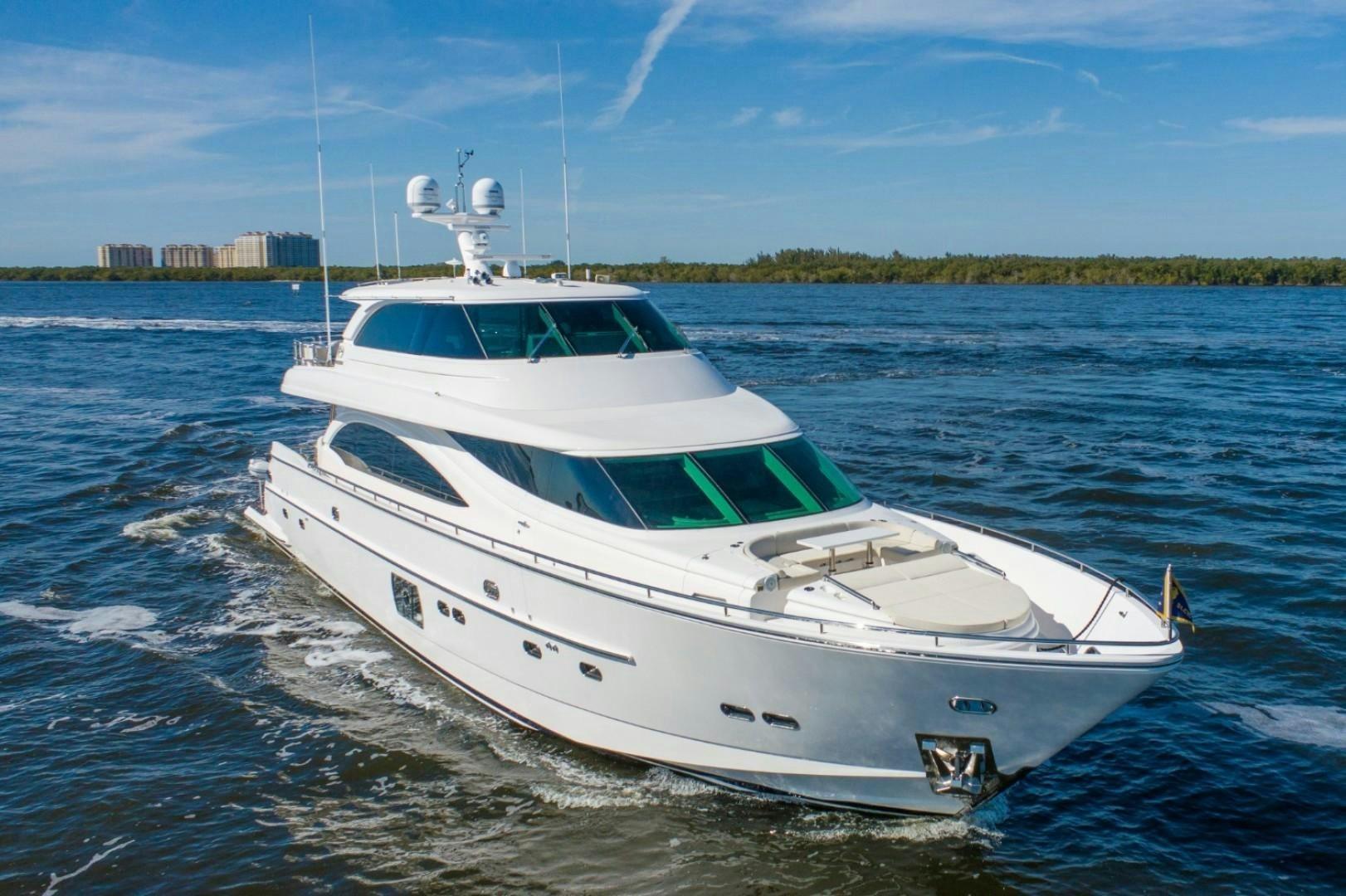 a white yacht on the water aboard TI AMO Yacht for Sale