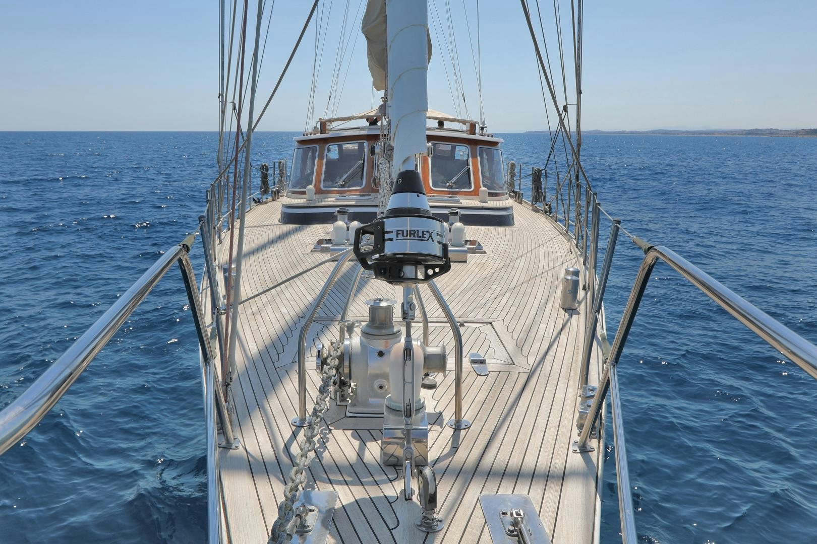 a boat on the water aboard IRON MONKEY Yacht for Sale