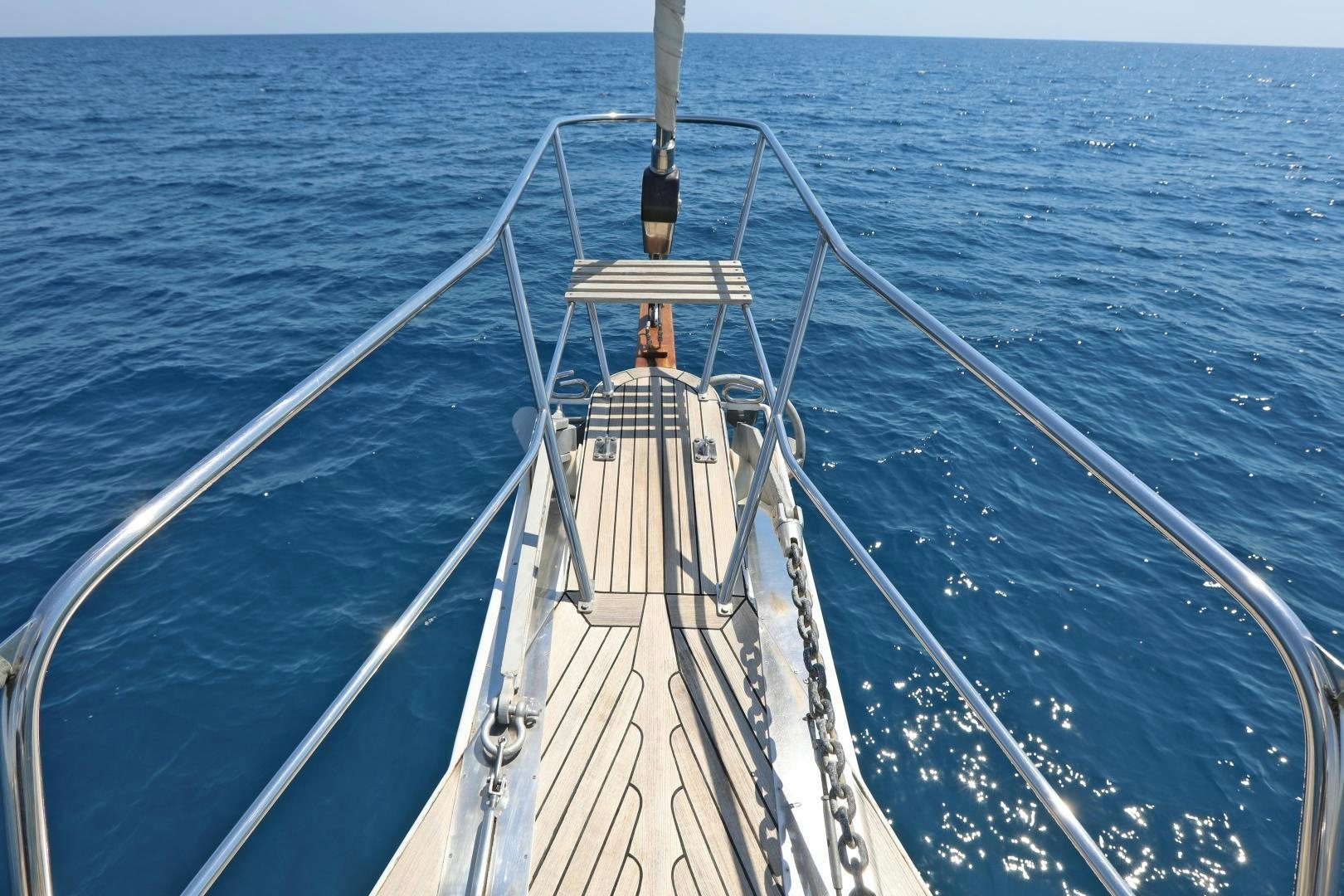 a large ship in the water aboard IRON MONKEY Yacht for Sale