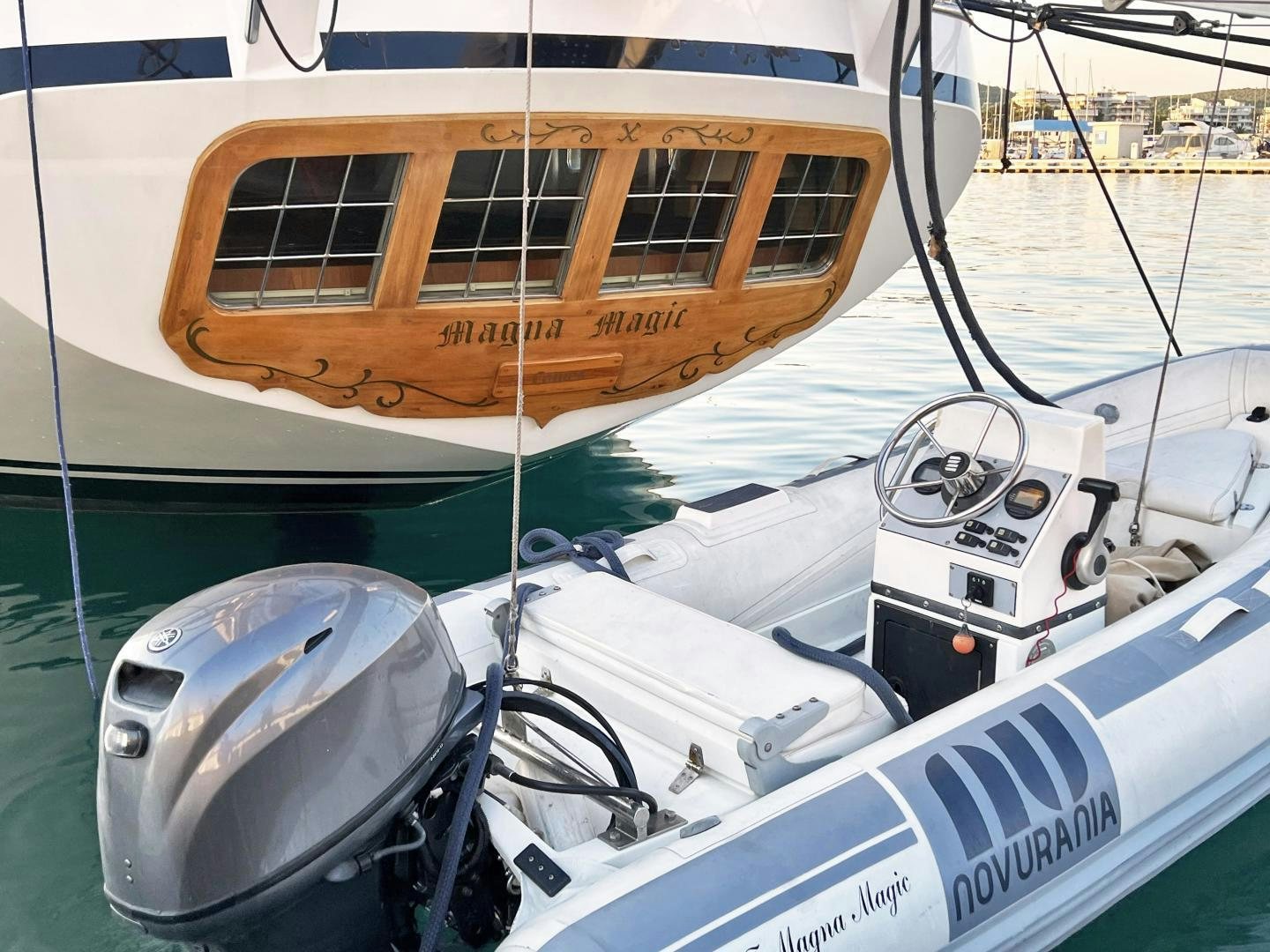 a boat with a motor attached to it aboard IRON MONKEY Yacht for Sale