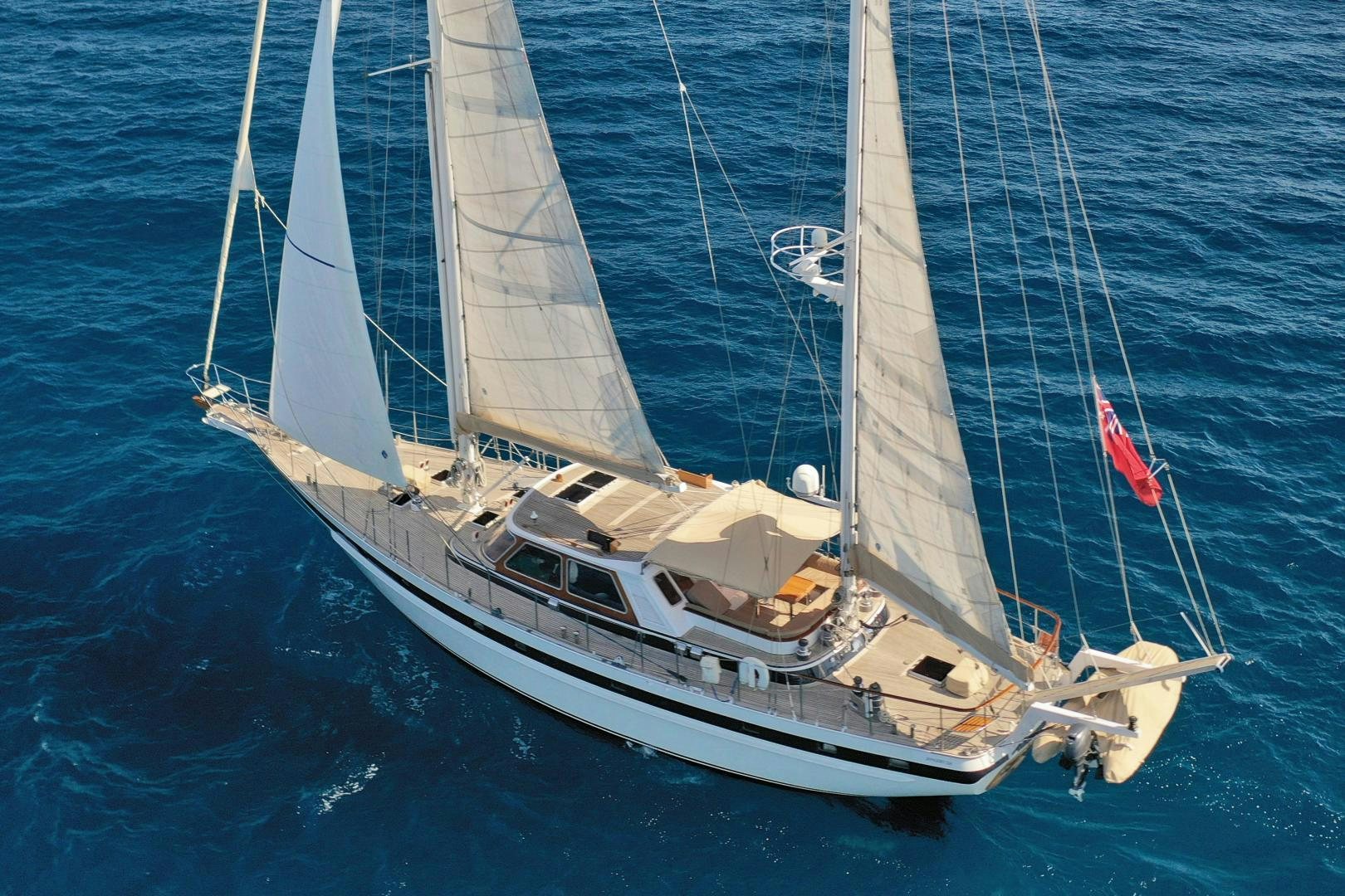 a sailboat on the water aboard IRON MONKEY Yacht for Sale