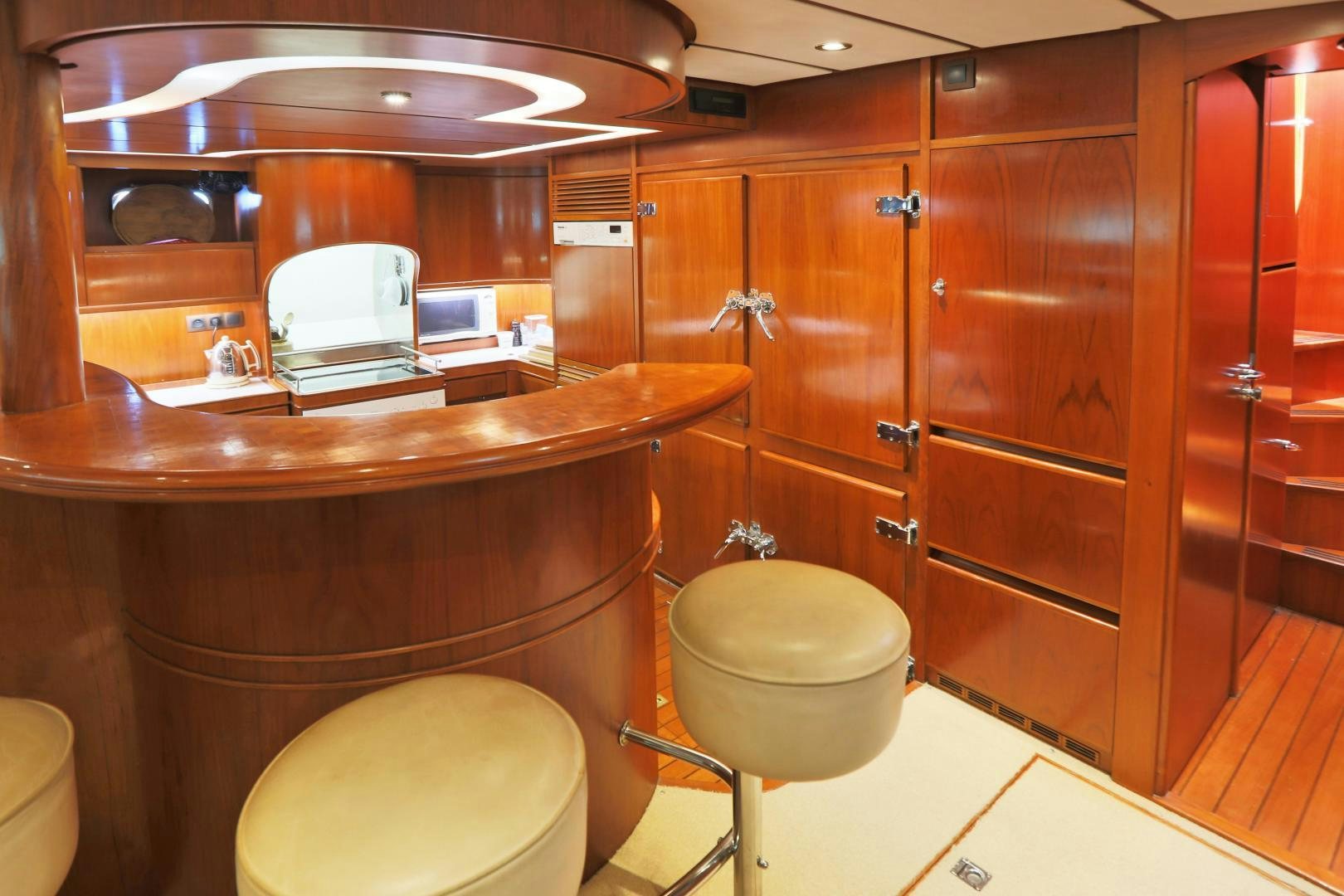 a bathroom with a toilet and a sink aboard IRON MONKEY Yacht for Sale