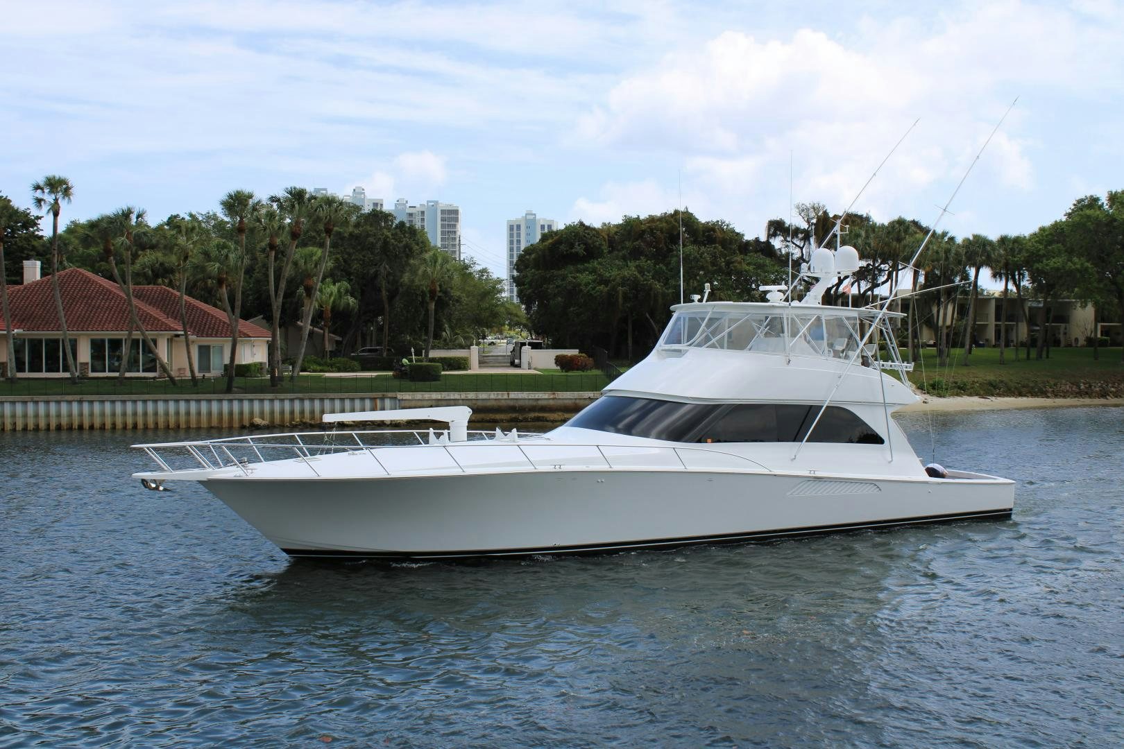 a white boat on the water aboard LUNA Yacht for Sale