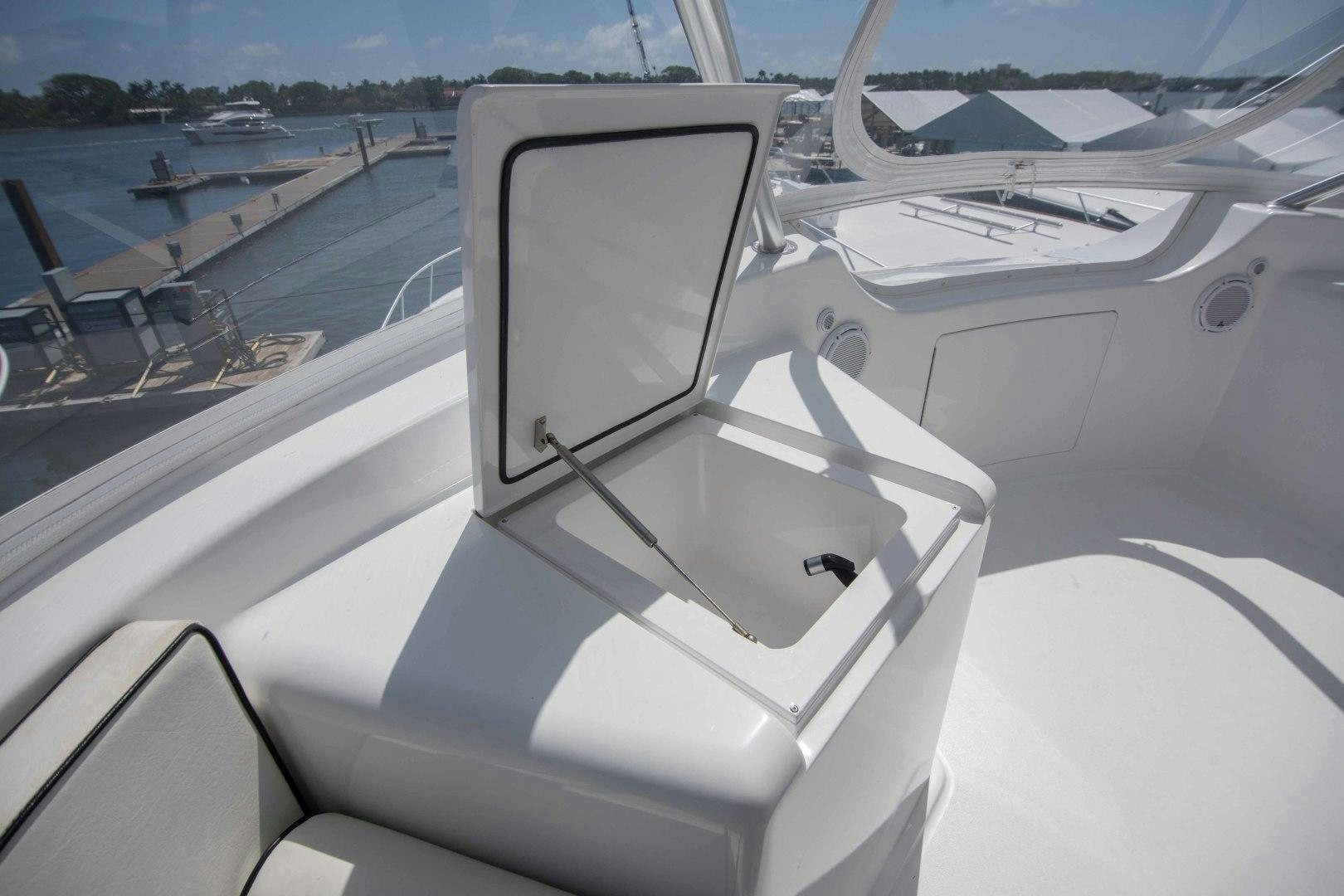 a white car with a screen on the front aboard LUNA Yacht for Sale