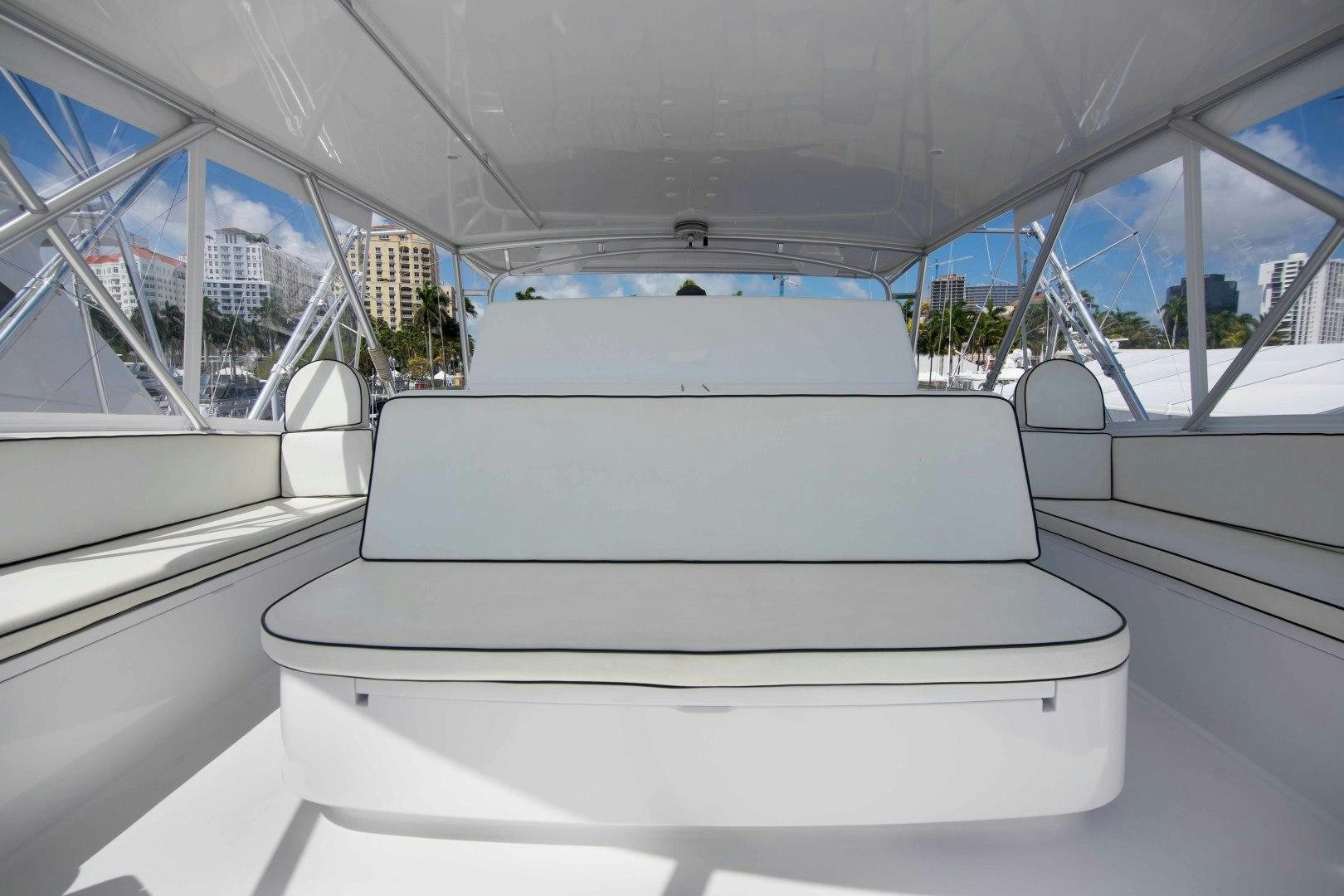 a white couch on a boat aboard LUNA Yacht for Sale
