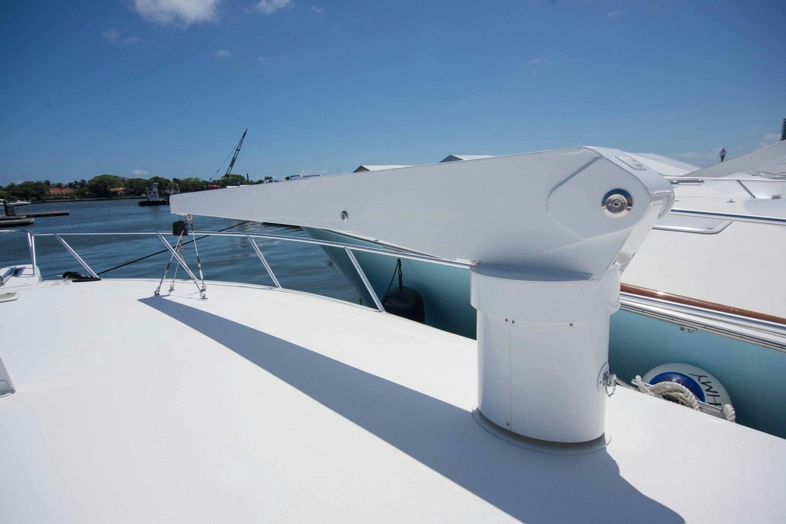 a white boat on a trailer aboard LUNA Yacht for Sale
