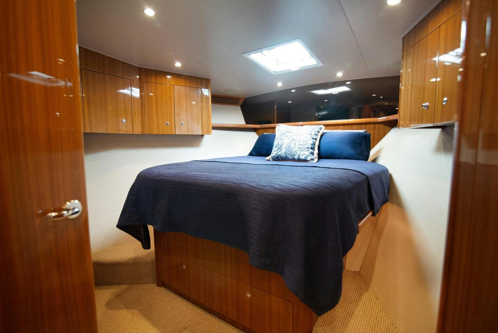 a bed in a room aboard LUNA Yacht for Sale