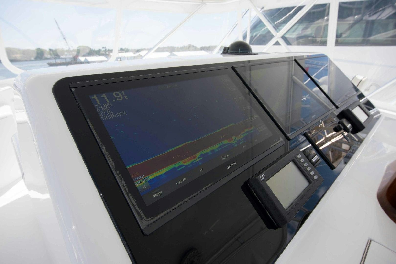 a screen on a car aboard LUNA Yacht for Sale