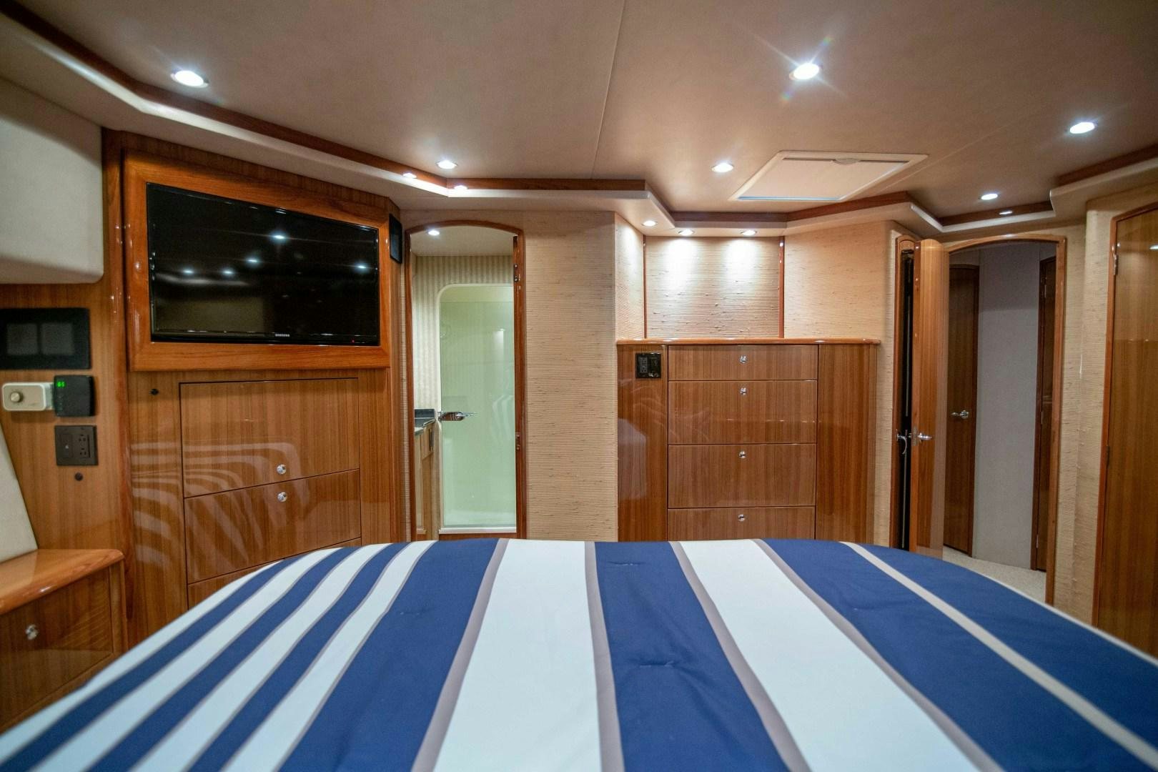 a large empty room with a pool table and a door aboard LUNA Yacht for Sale