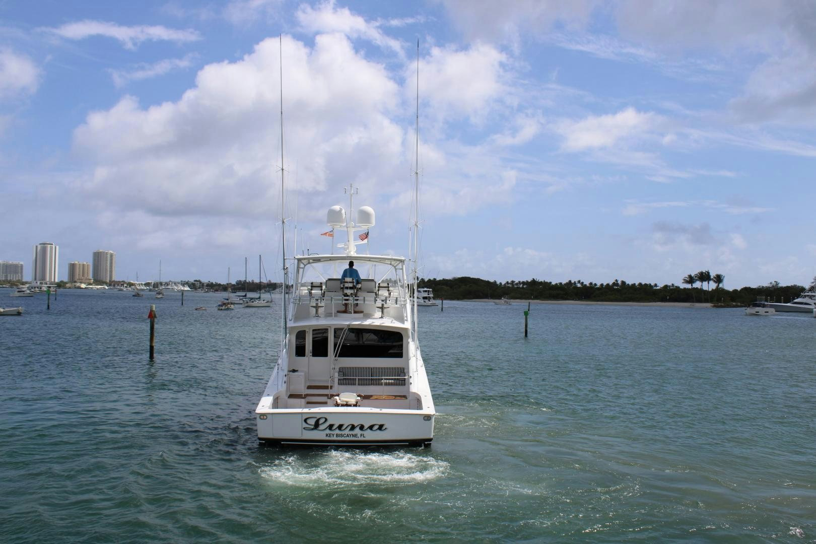 a white boat in the water aboard LUNA Yacht for Sale
