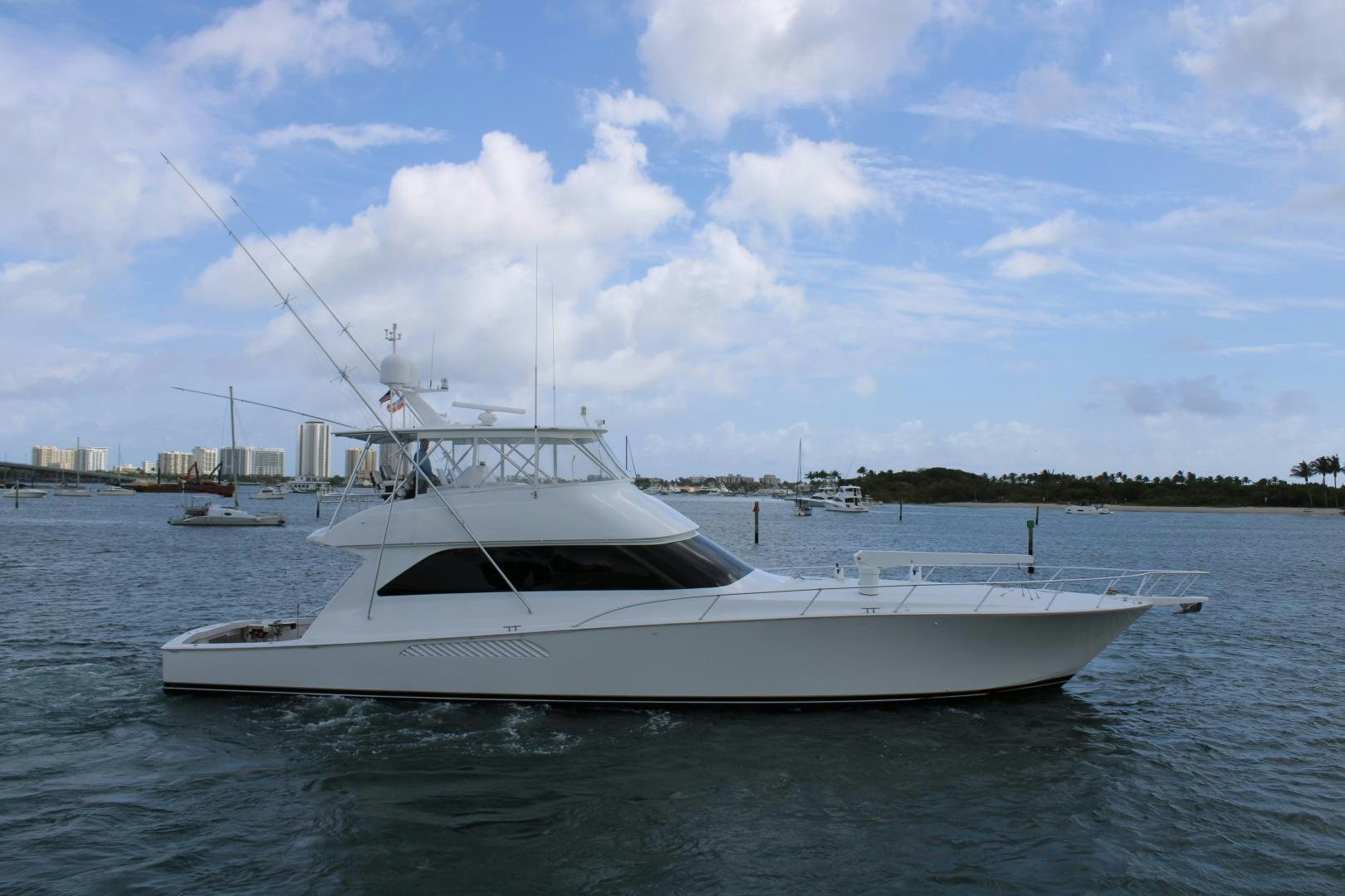 a white boat on the water aboard LUNA Yacht for Sale