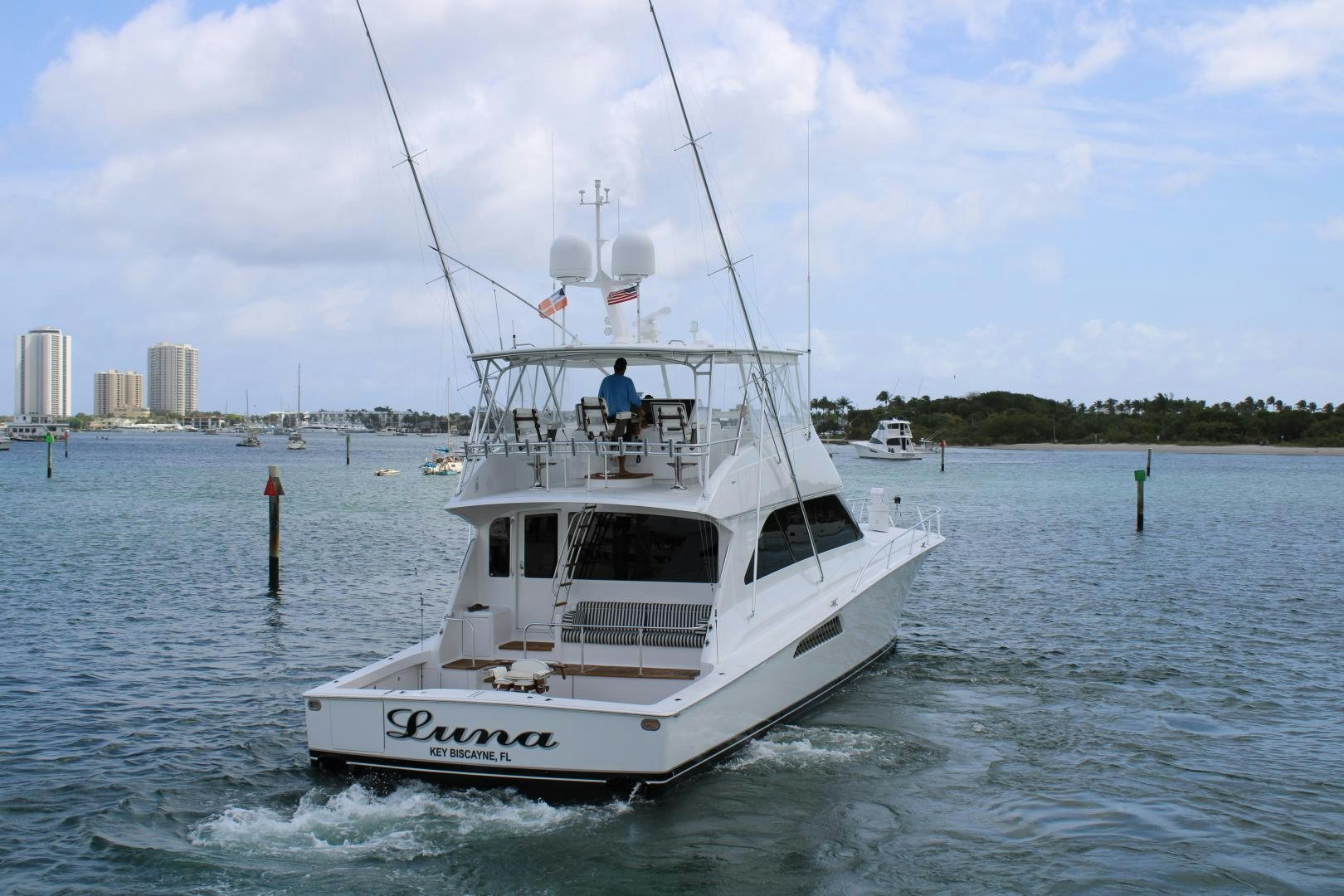 a white boat in the water aboard LUNA Yacht for Sale