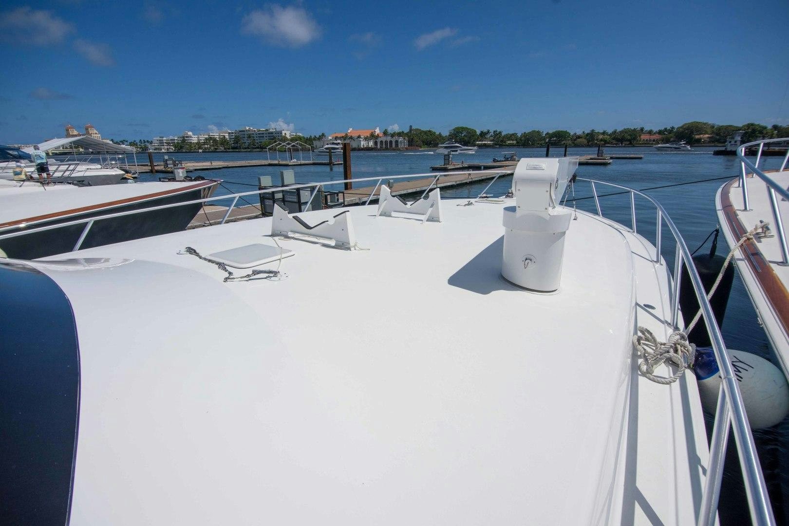 a boat with white sails aboard LUNA Yacht for Sale
