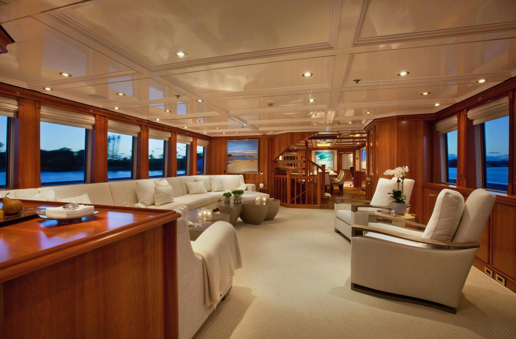 a room with a couch and a table aboard LEVERAGE Yacht for Sale