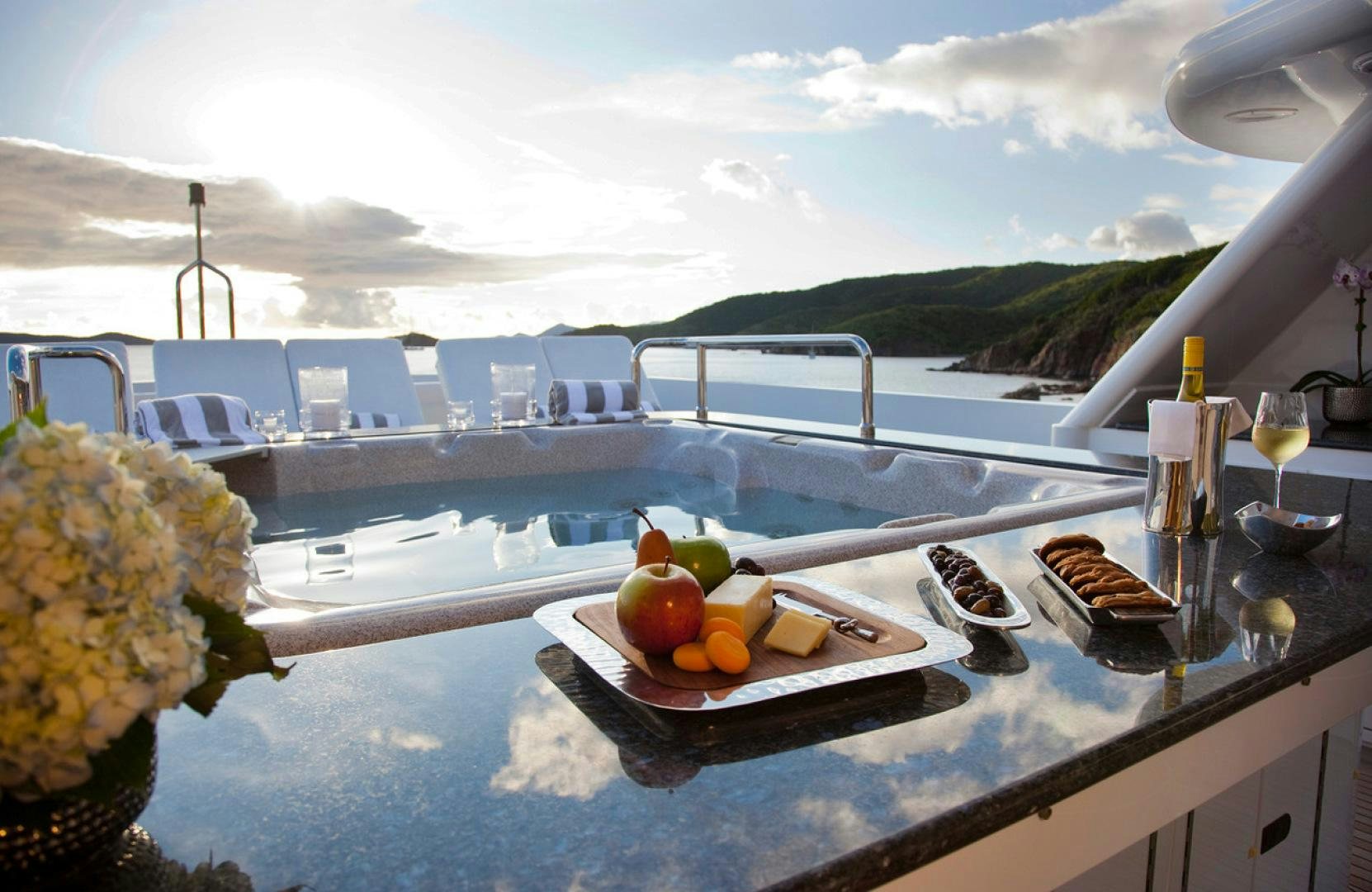 a table with food on it aboard LEVERAGE Yacht for Charter
