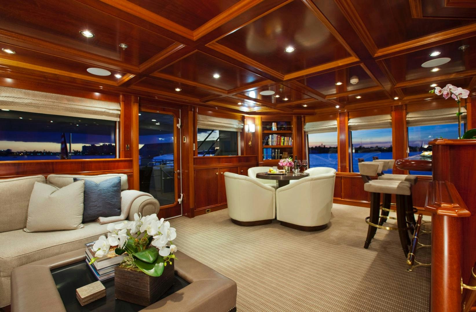 a living room with a large window aboard LEVERAGE Yacht for Sale