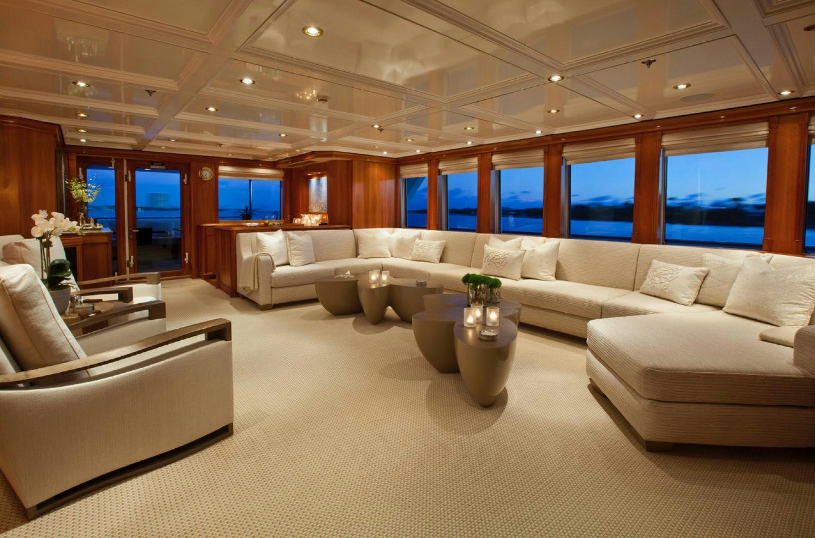 a living room with a couch and a table aboard LEVERAGE Yacht for Sale