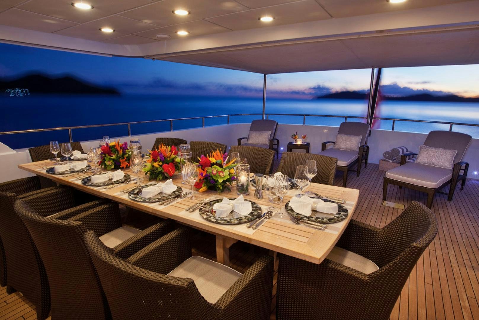 a table set for a dinner aboard LEVERAGE Yacht for Sale