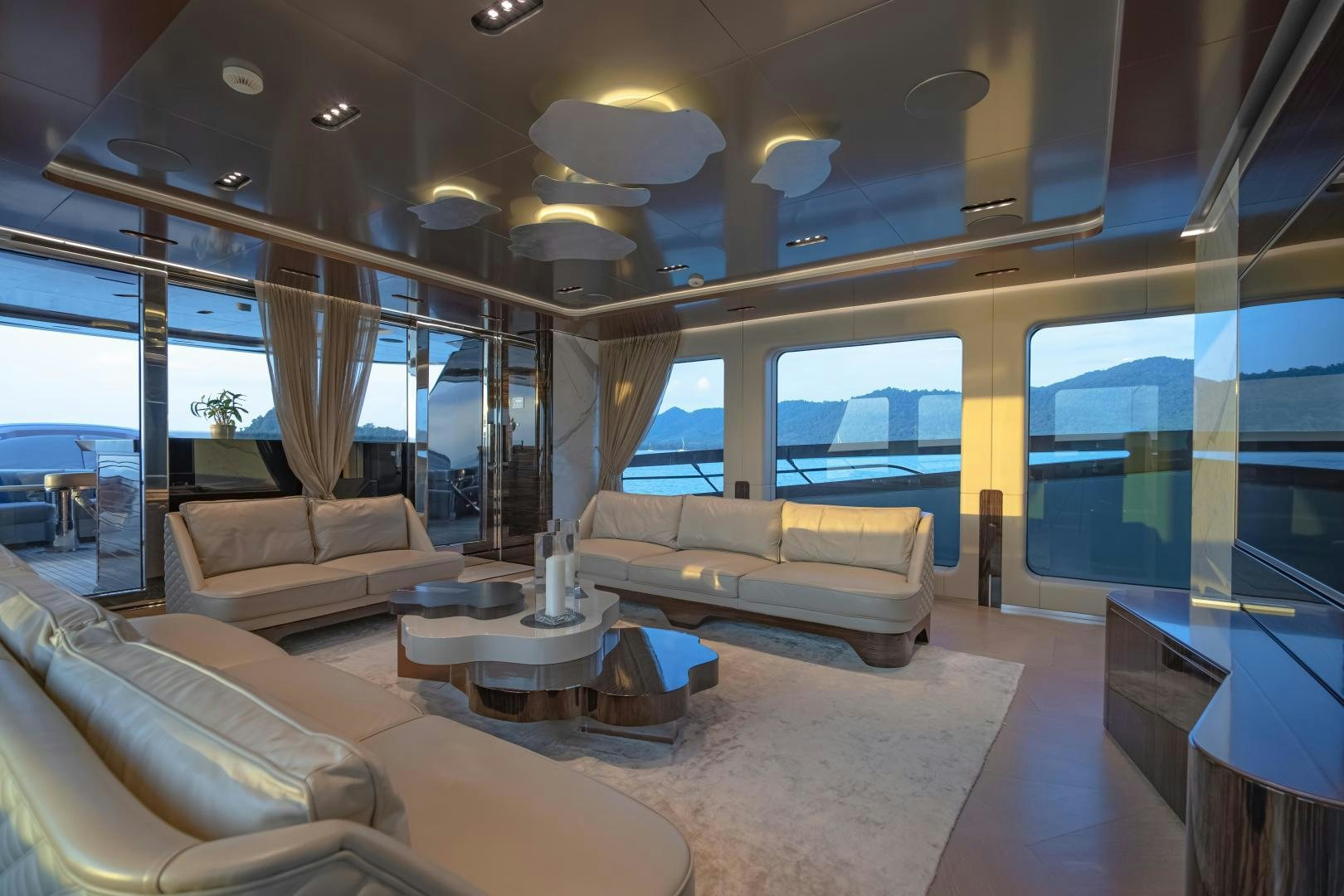 a living room with a large window aboard LA VIE Yacht for Sale