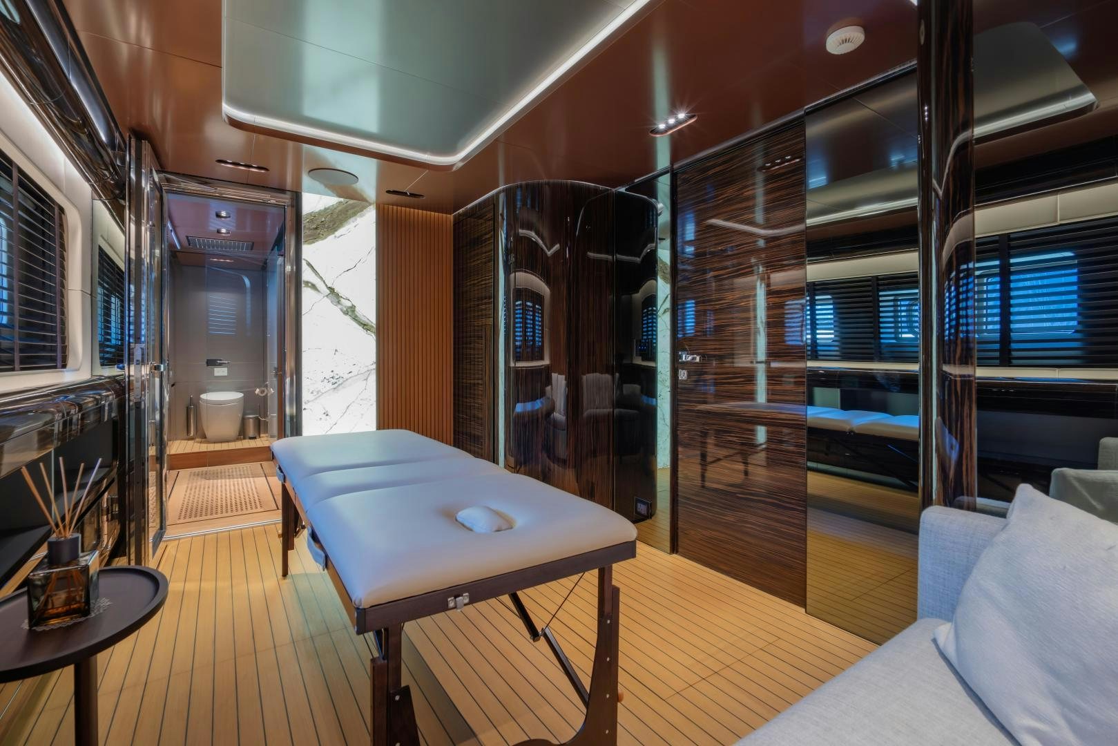 a room with a table and chairs aboard LA VIE Yacht for Sale