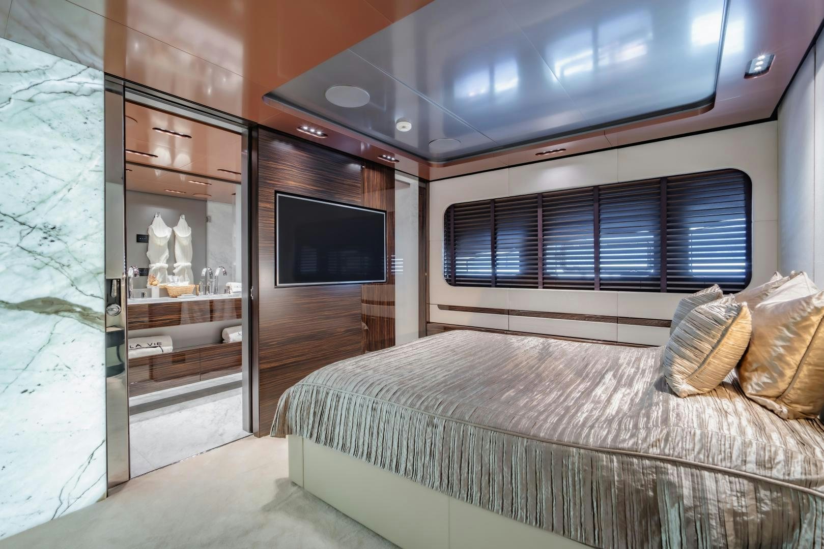 a bed in a room aboard LA VIE Yacht for Sale