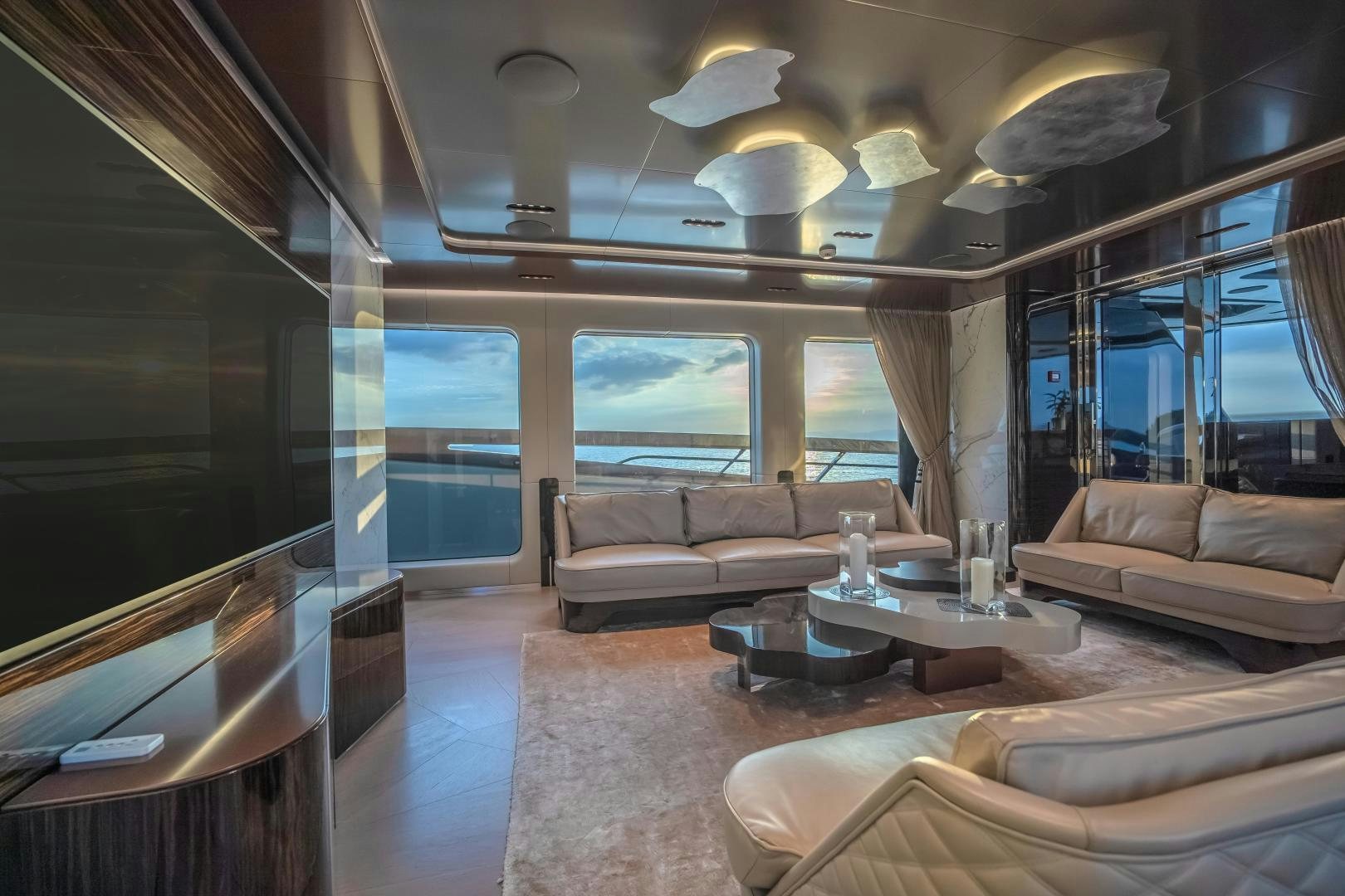 a living room with a large window aboard LA VIE Yacht for Sale