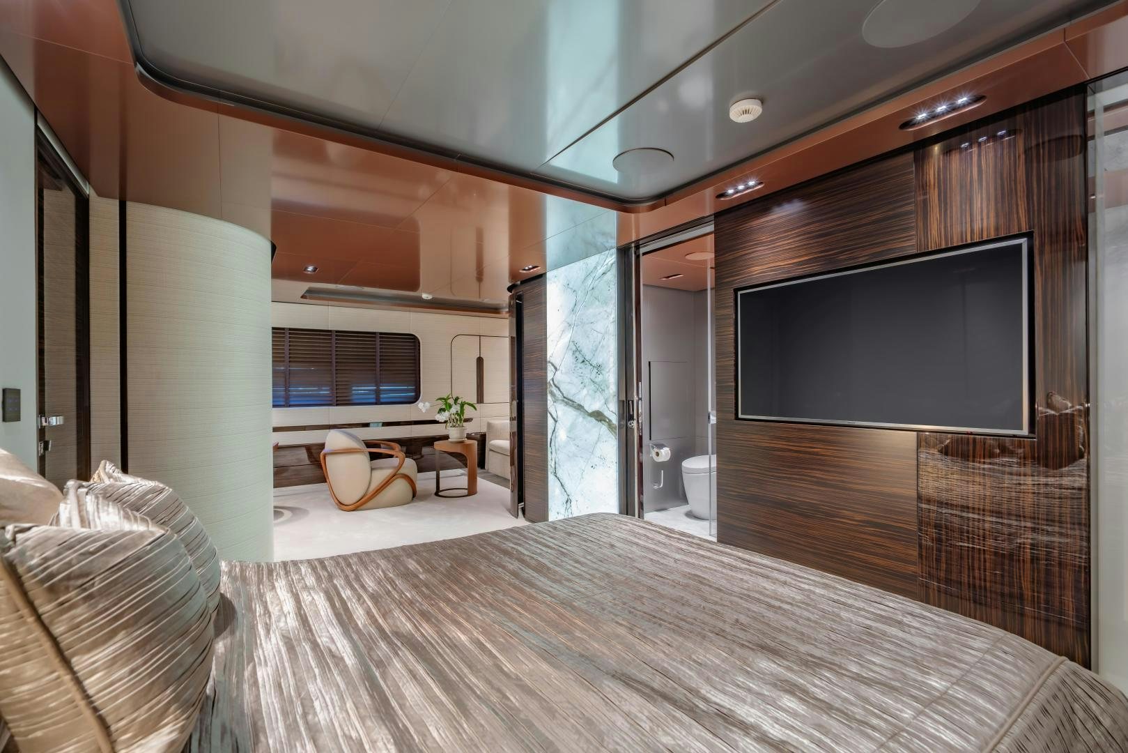 a room with a tv and furniture aboard LA VIE Yacht for Sale