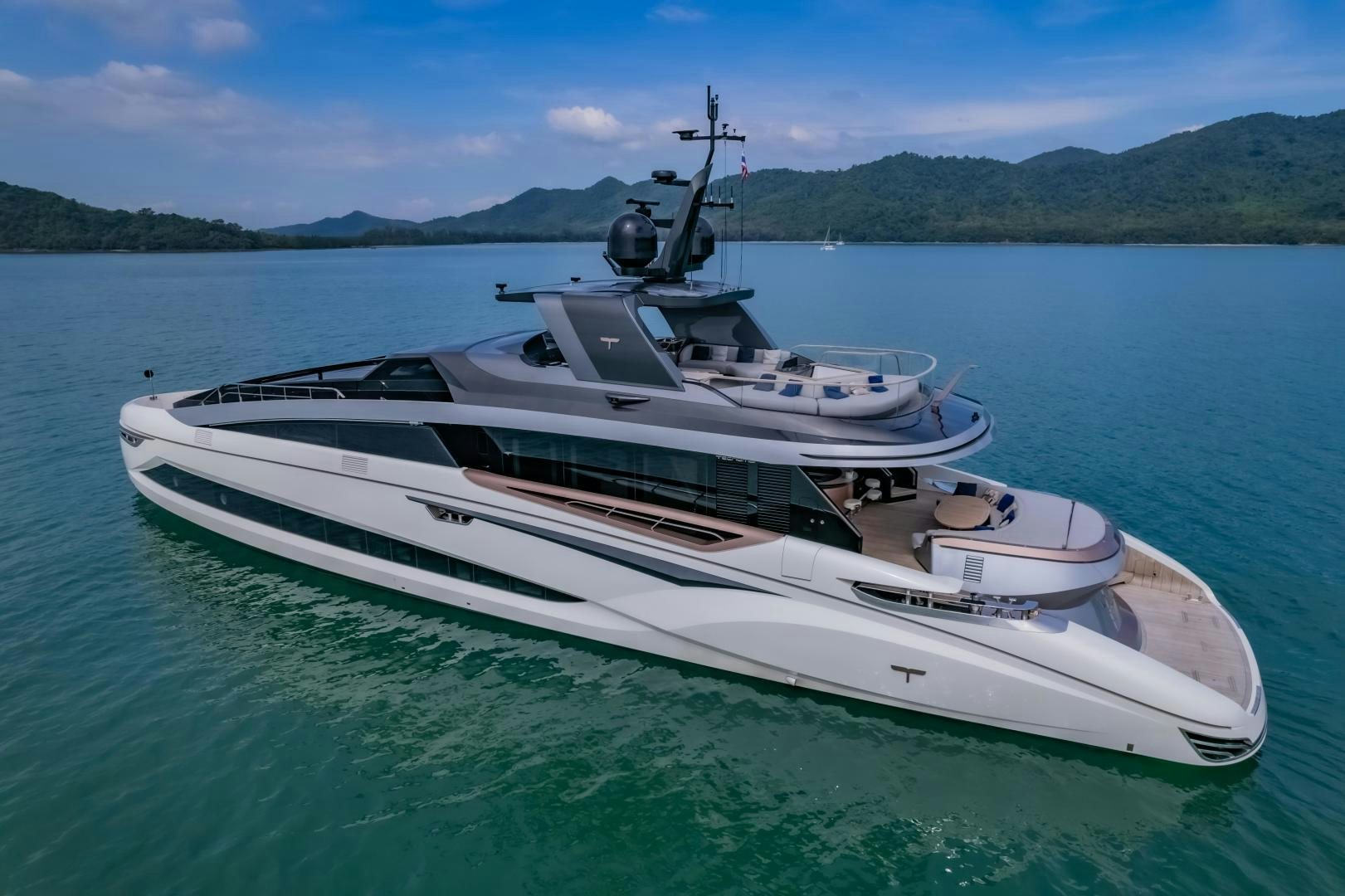 a white boat on the water aboard LA VIE Yacht for Sale