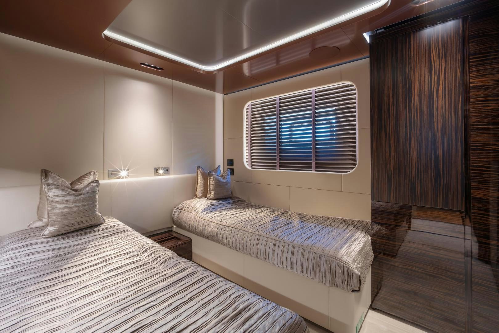 a room with two beds aboard LA VIE Yacht for Sale