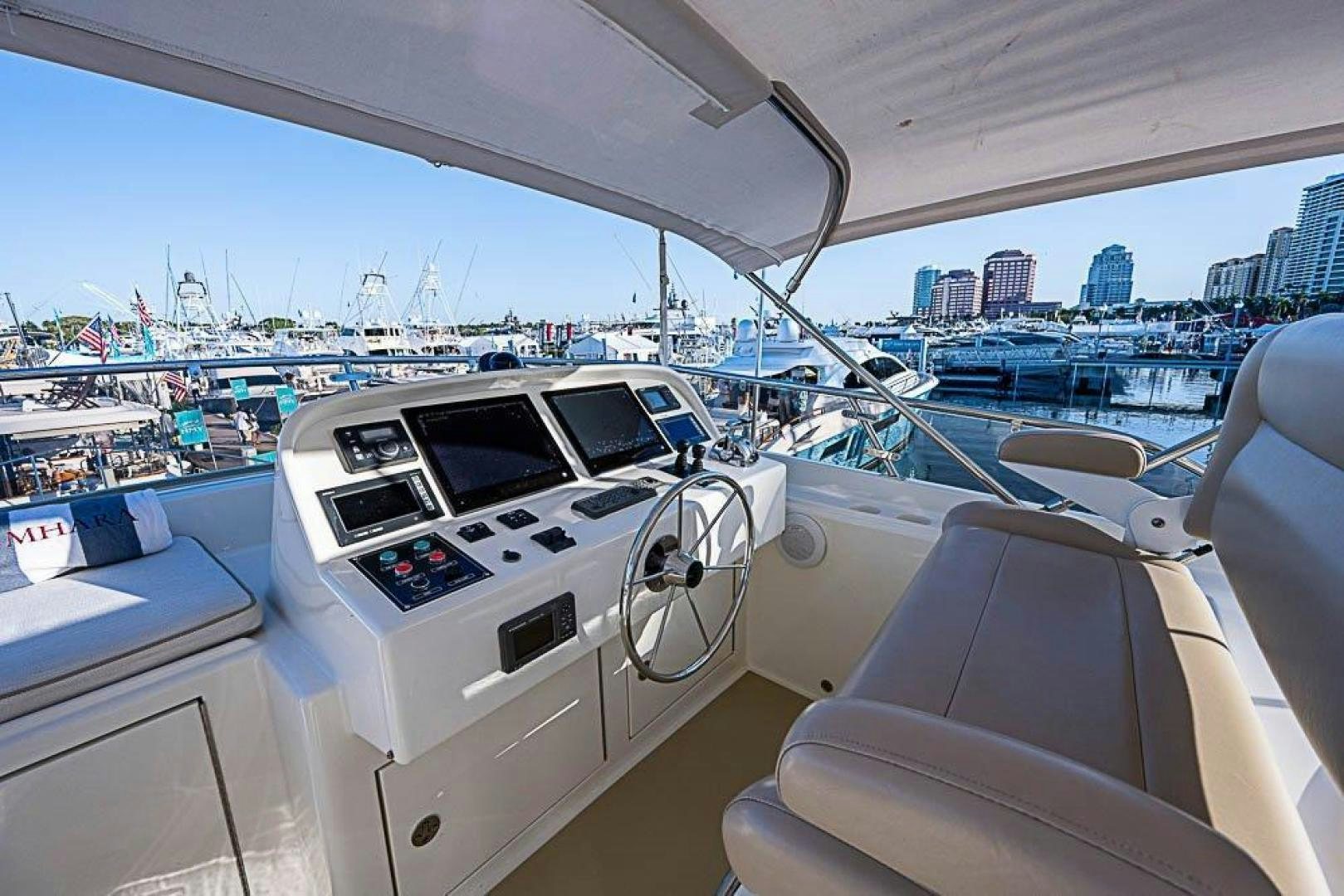 a white car on a boat aboard NAMHARA Yacht for Sale