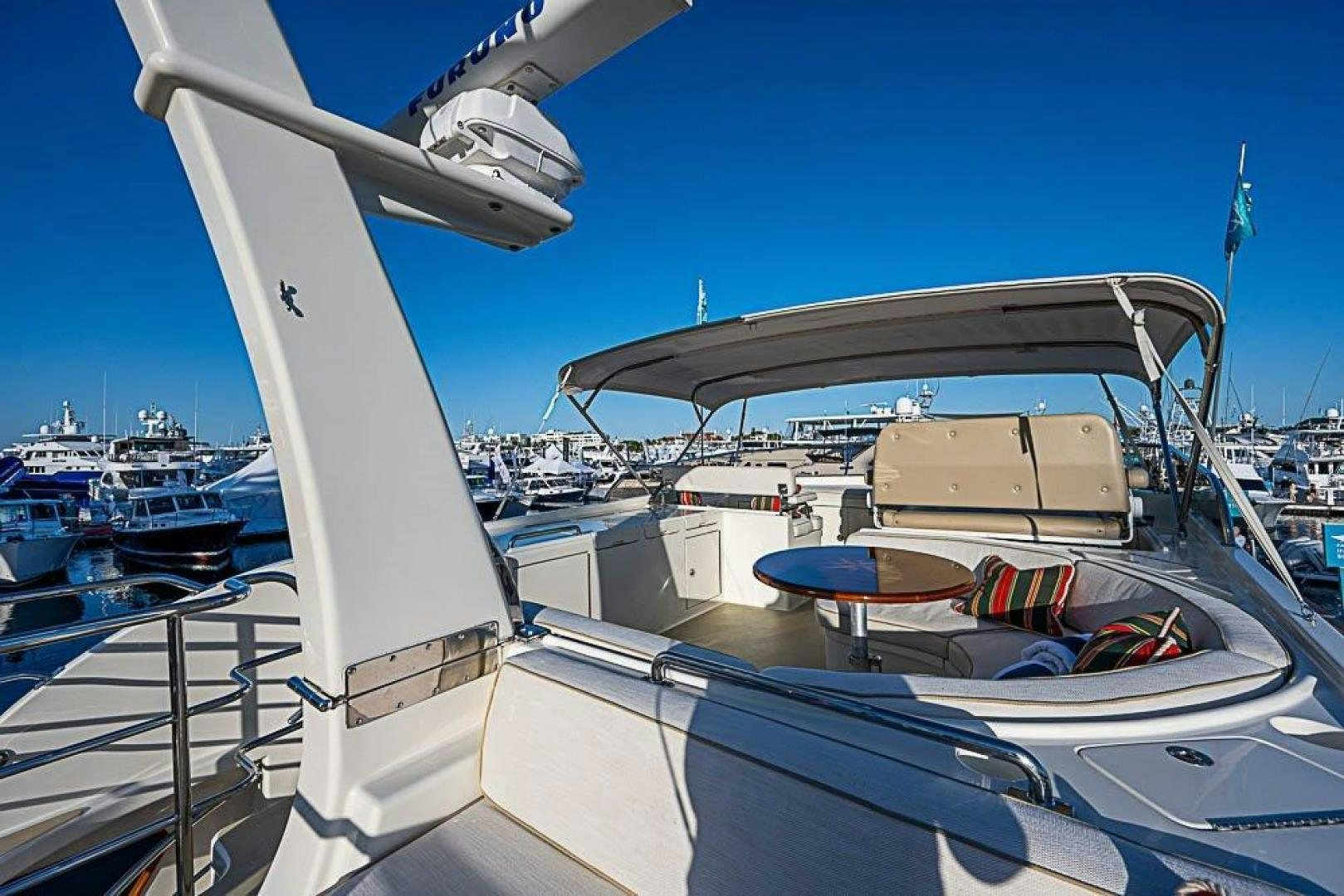 a boat docked at a pier aboard NAMHARA Yacht for Sale