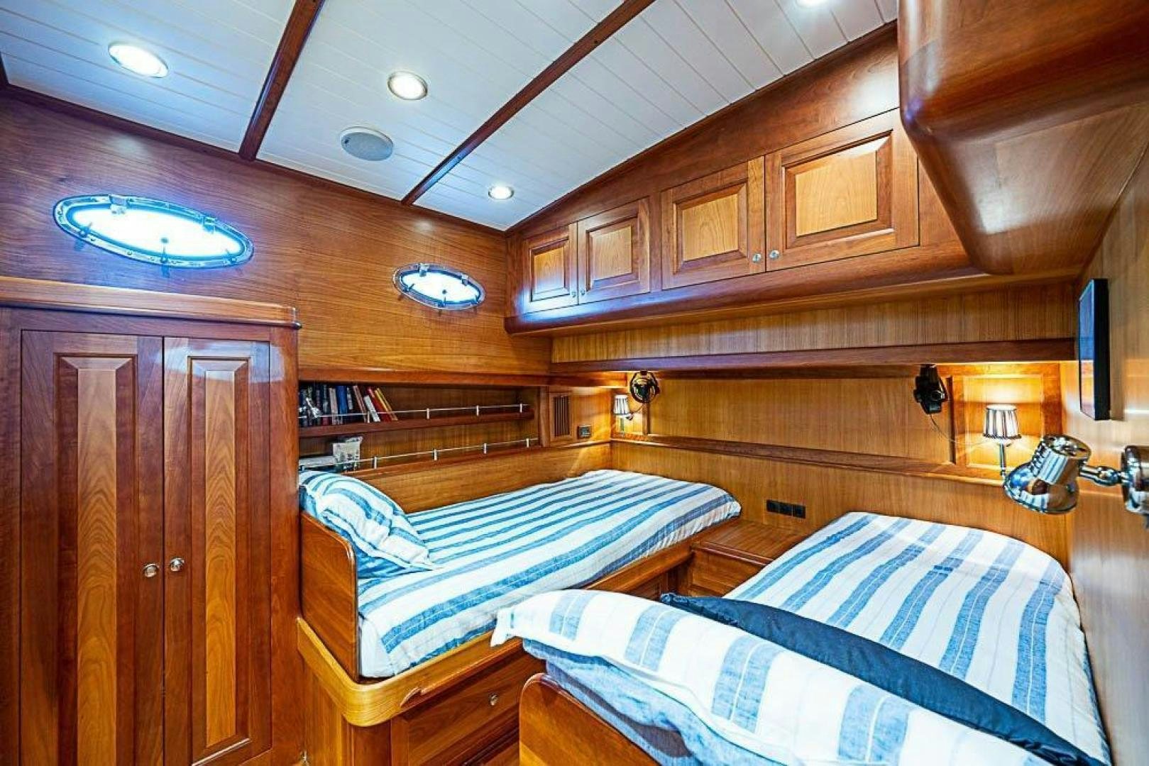 a couple of beds in a cabin aboard NAMHARA Yacht for Sale