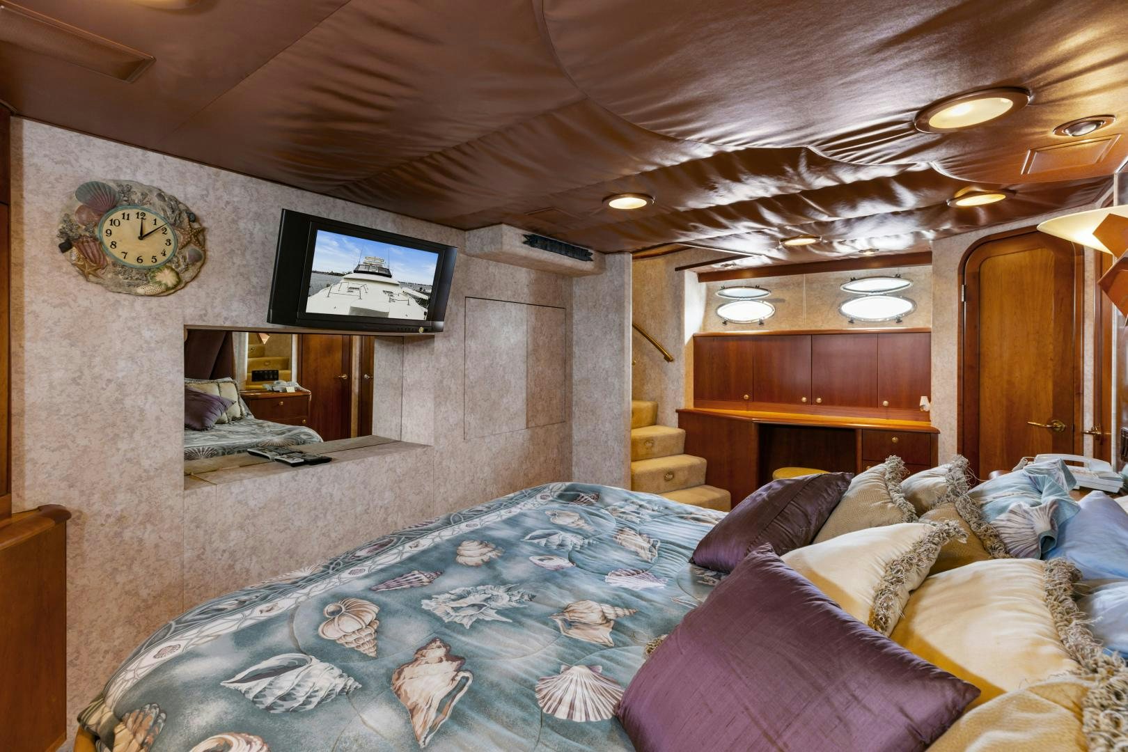 a bedroom with a large bed aboard WANDERLUST Yacht for Sale