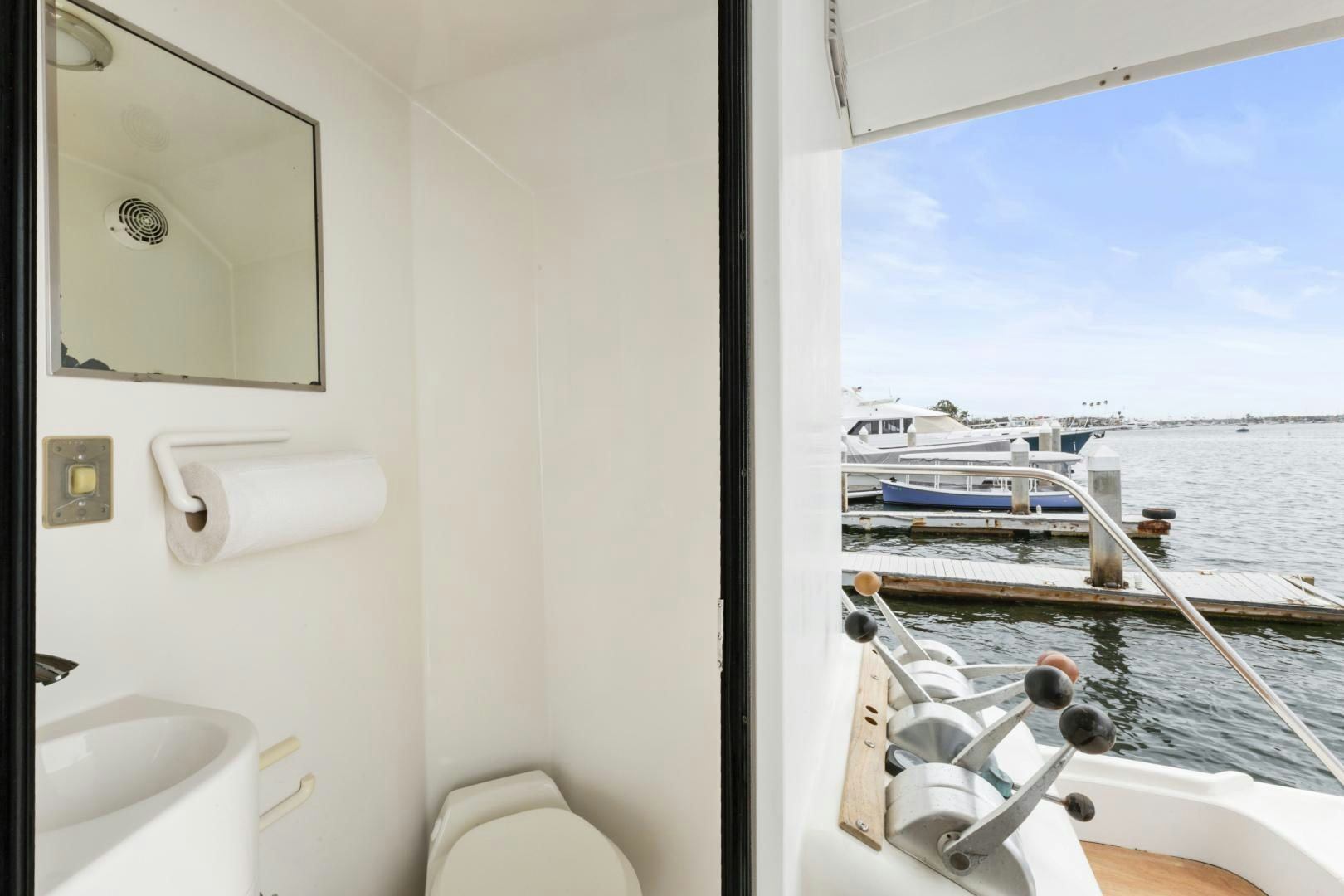 a bathroom with a sink and a toilet aboard WANDERLUST Yacht for Sale