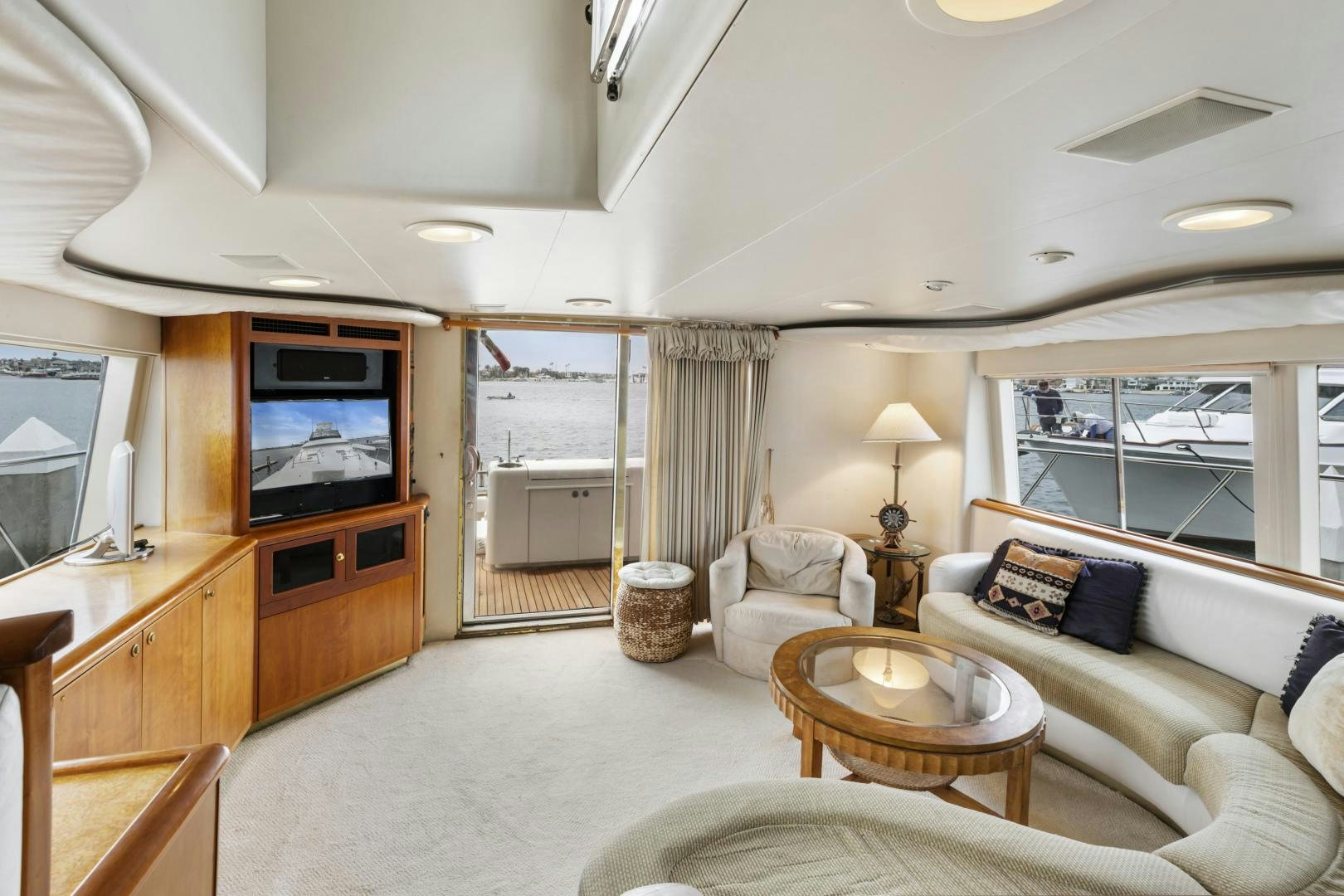 a living room with a large window aboard WANDERLUST Yacht for Sale