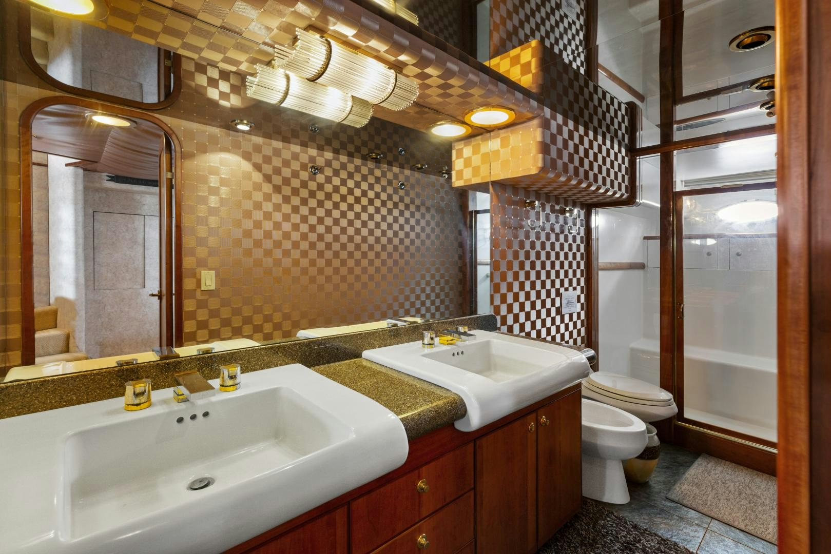 a bathroom with a sink and a toilet aboard WANDERLUST Yacht for Sale